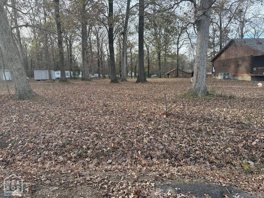Two parcels included for the price of one! The buildable lot is located at 215 Jackson, and an additional parcel (the Dogwood property) is included and sits directly behind 215 Jackson. The Dogwood parcel is not buildable, but provides added land and potential uses such as extra space, privacy buffer, or investment hold.