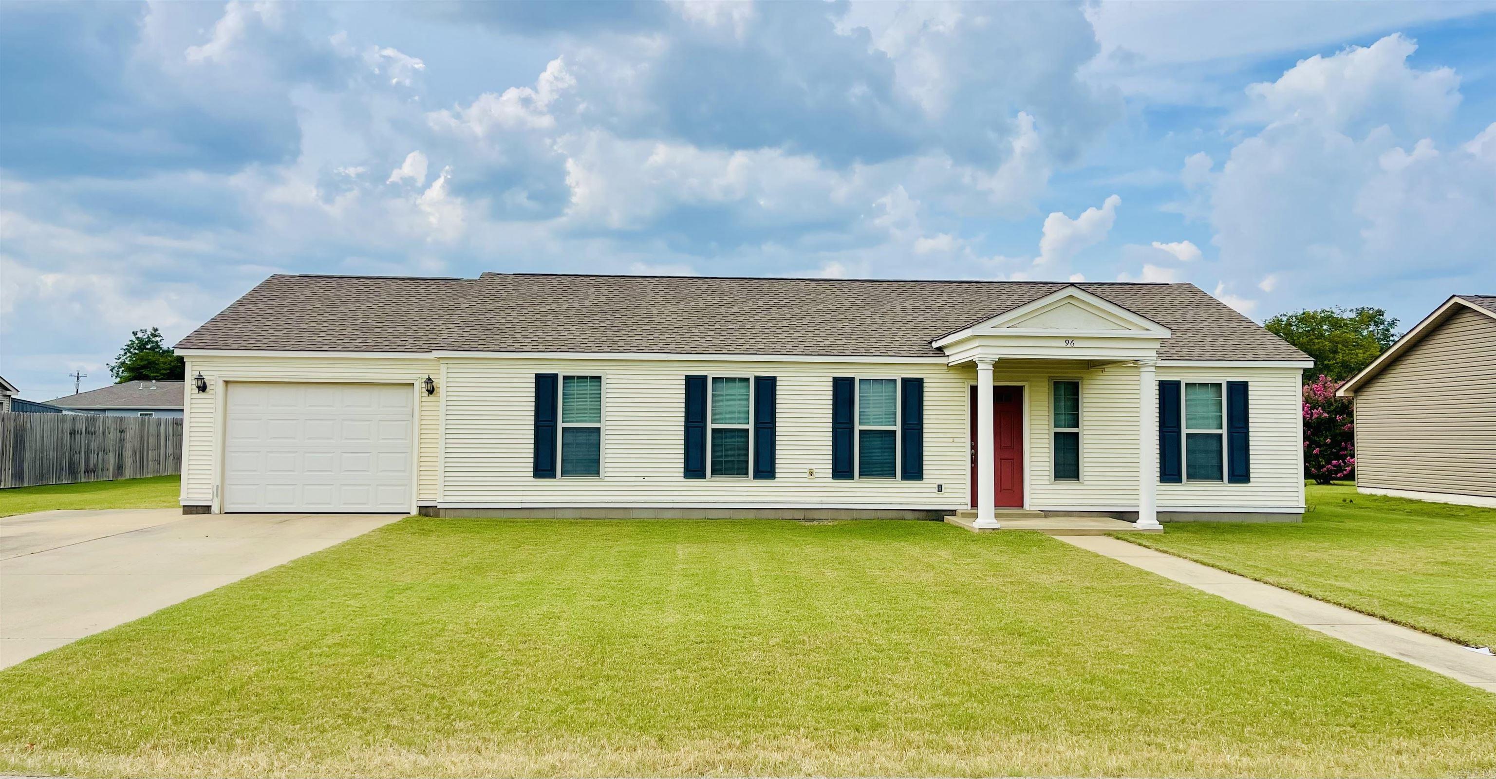 Welcome to this well-maintained, one-owner 4-bedroom, 2-bath home located in the desirable River Park Subdivision in Lake City, Arkansas. This move-in-ready home offers a spacious living room with a dining area, creating a comfortable space for everyday living and entertaining.  The kitchen comes fully equipped with an electric range, microwave vent hood, refrigerator, pantry, and a recently installed dishwasher. Attractive acid-stained concrete floors run throughout the home, providing durability and easy maintenance.  The attached one-car garage includes a convenient exterior access door.   Step outside to enjoy the patio, perfect for grilling or relaxing with outdoor furniture. The backyard features a clean workshop with a concrete floor and manual overhead door, offering excellent storage or workspace. The yard is partially fenced, with additional property extending beyond the fenced area.  The landscaping has been left as a blank canvas, giving new owners the opportunity to create their own outdoor vision. Additional updates include a roof that is approximately nine years old.