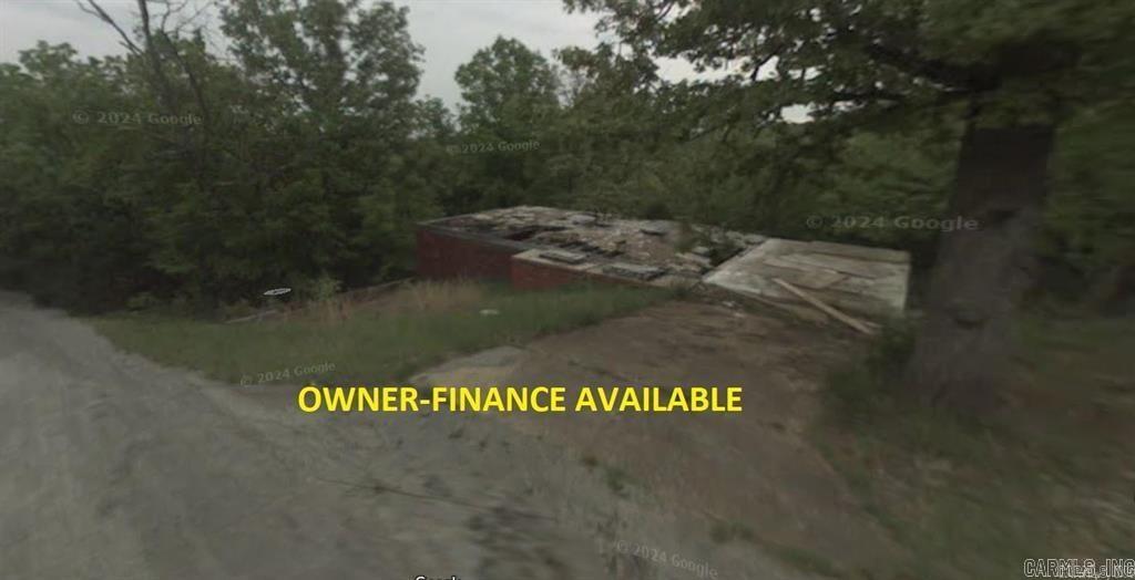 Owner-finance for easy terms. Stellar deal on a partially developed home! Concrete is poured for the driveway and garage. Crawlspace brick foundation already set up. Utilities may be present as well and to be verified by the buyer. The work that has already been done and remains of previous home is worth well over 70k in development savings. Cash or finance buyers can pay by debit or credit card as well. Nice size lot as well. Owner/agent. Finance is an extra $250 with no interest or prepayment penalty. 10 months at $400 and closing costs are included. Buyer responsible for any/all taxes and lot sold "as-is". Parcel ID# 306-00419-000