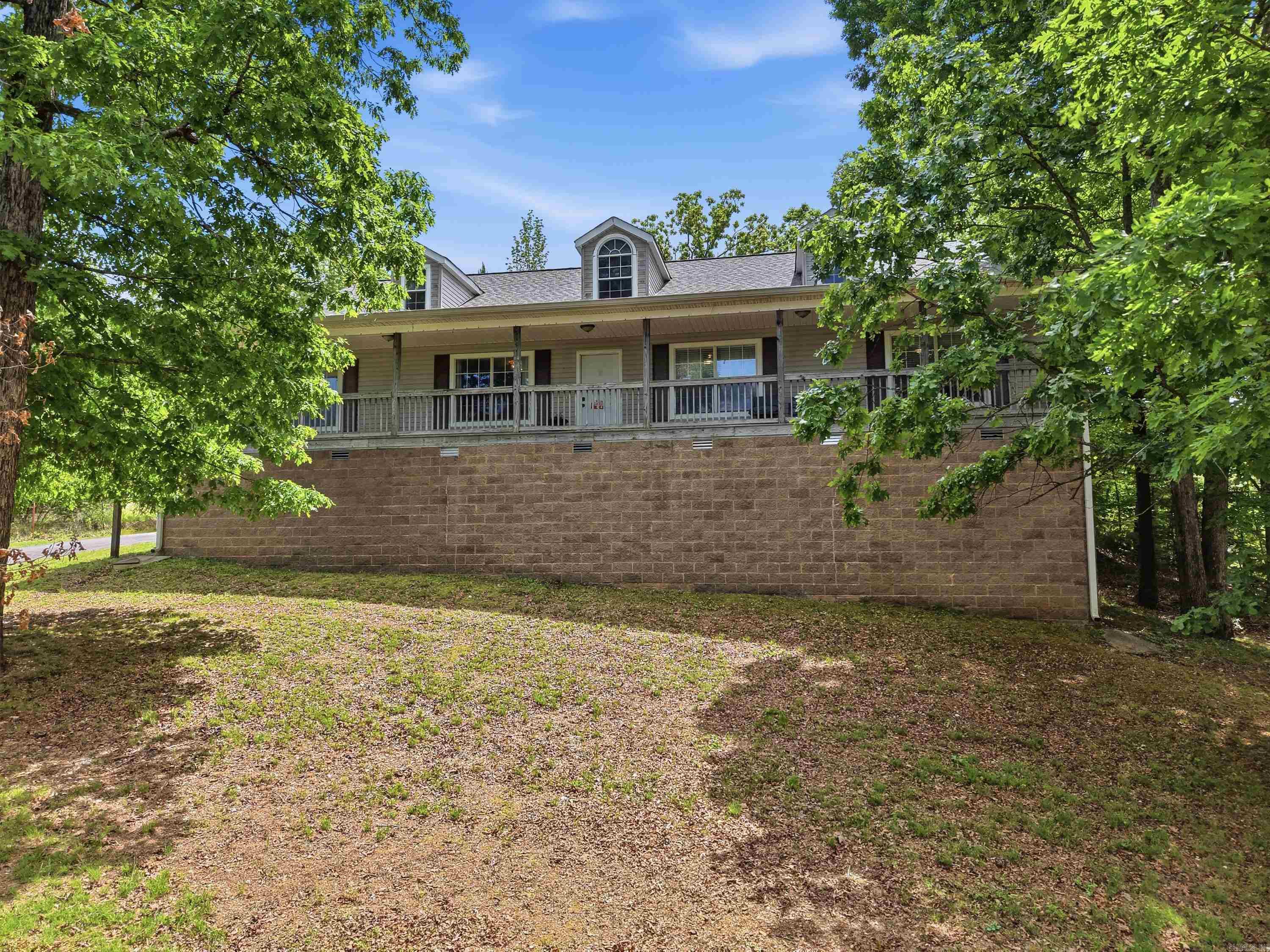 Perched atop a scenic hill with sweeping views of the Saline River Valley, this beautiful 4-bedroom, 3-bath home offers the perfect blend of comfort, space, and tranquility. The all-electric design features a spacious kitchen with granite countertops, ideal for both everyday living and entertaining.  Enjoy mthe inviting porch where you can relax and take in the peaceful surroundings. Inside, a versatile bonus room provides the perfect space for a home office, playroom, or guest retreat. The layout offers flexibility and functionality for modern living.  Outside, the fenced backyard adds privacy and room to roam, 2  garages offers dedicated spaces with room to accommodate up to 4 vehicles. Located just a short walk from the Saline River and minutes to downtown Benton, this property is perfect for outdoor enthusiasts who enjoy kayaking and nature.  If you’re looking for a quiet retreat with beautiful views and practical amenities, this home delivers it all.