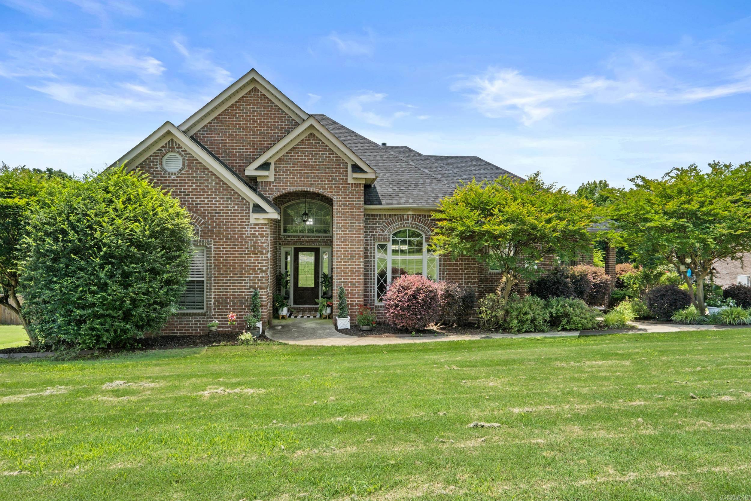 Beautiful 4-bedroom, 3-bath home in desirable Greystone offering 3,440 square feet on a spacious .42-acre lot! This home features a beautiful living room, a dining area, a cozy hearth room, and a versatile bonus room with custom built-ins and incredible storage. The large primary suite offers ample closet space, and dual vanities. Enjoy the fully fenced backyard along with a golf cart garage located beneath the home. With so much space and flexibility, this home is perfect for entertaining and everyday living! New Paint in 2024 and New Roof in 2024! Freshly painted deck 2026! You don't want to miss it! Give me a call!