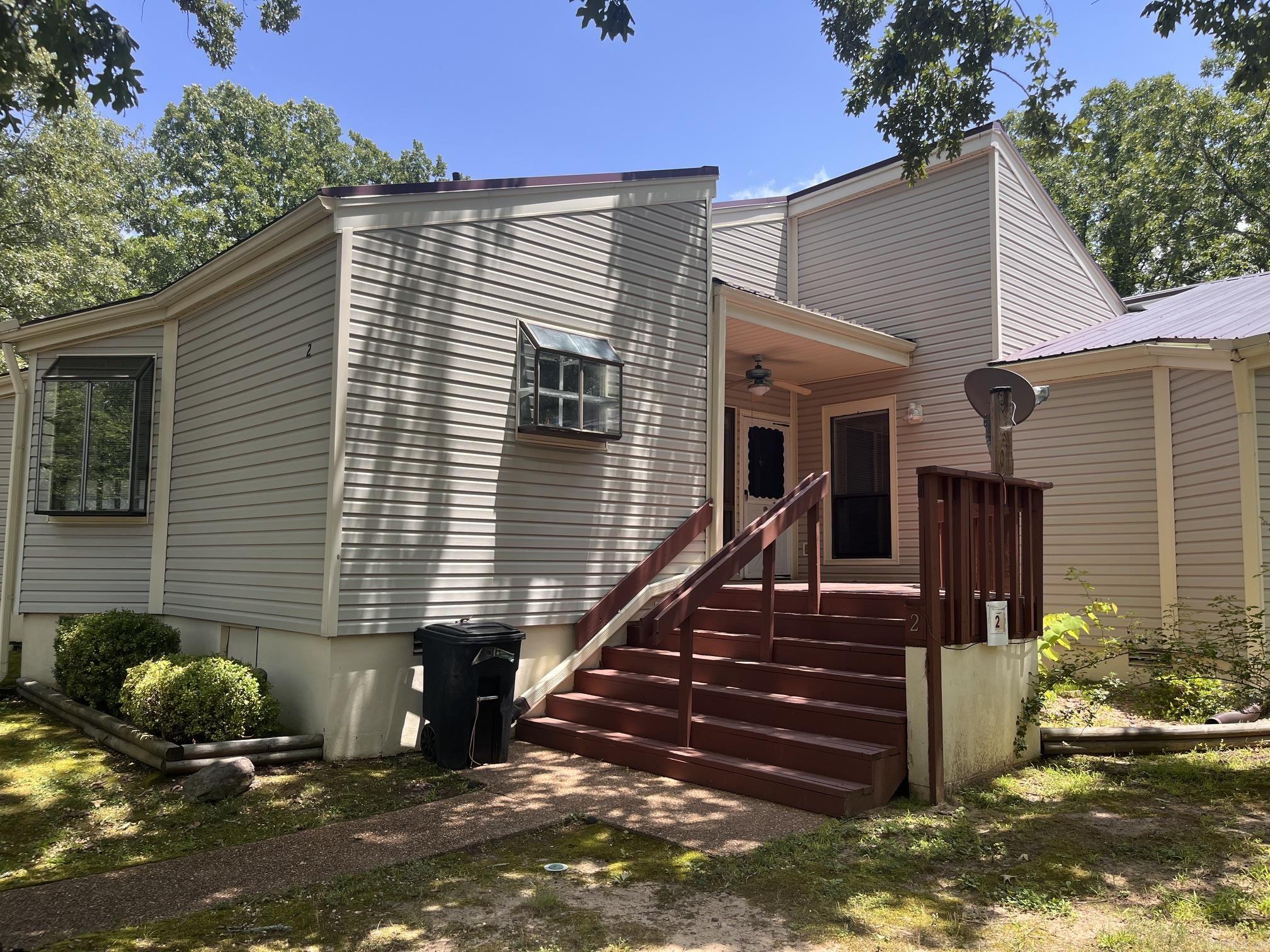 Welcome to the perfect retirement retreat in the heart of the Ozarks. If you love the beauty of the country and the peace of nature—but don’t want the maintenance of a large property—this move-in-ready condo checks every box.  Offering 1,095 square feet, this well-maintained home features 1 spacious bedroom and 2 full bathrooms, providing both comfort and functionality. The layout is thoughtfully designed for easy living, with:  A welcoming front porch perfect for morning coffee  A relaxing back deck for enjoying fresh Ozark air  Beautiful bay windows in the kitchen complete with growing shelves—ideal for potted plants and herbs  Central heat and air for year-round comfort  An updated master shower for a modern touch  This low-maintenance property allows you to spend more time doing what you love. Located just minutes from Greers Ferry Lake, you’ll enjoy convenient access to boating, fishing, and lakeside relaxation. You’re also close to local amenities including golf, restaurants, bowling, and the arcade—everything you need for active and social living.  Whether you’re downsizing, retiring, or simply ready for a simpler lifestyle, this condo offers affordable living.