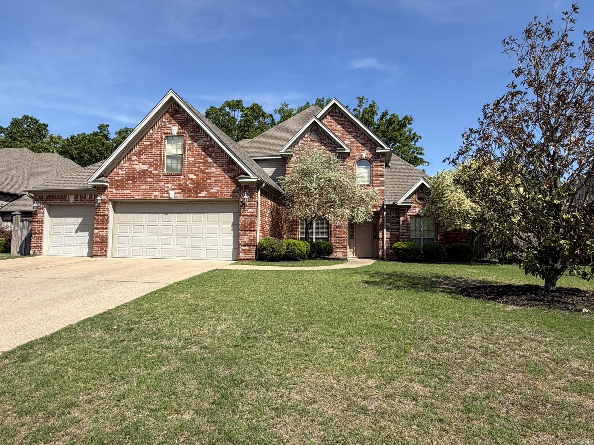 Well-maintained 4 Bedroom, 3 bath home with golf course frontage and a huge bonus room. Enjoy the covered patio overlooking a private, tree-lined backyard. The main level features a very spacious primary suite with double vanities, jetted tub, separate shower, and walk-in closet, plus a guest bedroom and full bath. Upstairs offers 2 large bedrooms, and a shared full bath with separate vanity areas, and an oversized bonus room that could serve as a 5th bedroom, playroom, or media room. This home offers abundant closet space, a large great room with high ceilings, and a spacious kitchen with ample cabinet space, pantry, dining room, and 2 fireplaces, one in kitchen/hearth area and one in the great room. Additional features include a generator, 3 car garage, and a backyard lot that extends beyond the existing iron fence. Seller is providing buyer with a 1 year Choice home warranty.
