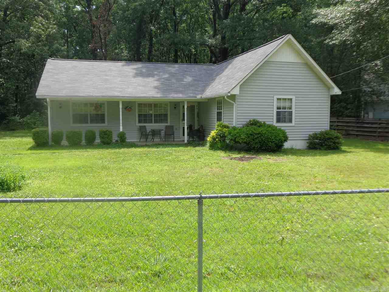 Looking for elbow room? RV hook-up at parking pad area (Sewer & Electricity) All rooms are large, the great room is huge!! .40 of an acre lot, 2 storage buildings, Split bedroom plan, 3 large bedrooms and 3 full baths, maintenance free exterior, patio. Lots of updates and improvements: Roof and AC unit replaced in Oct 2015, new tile floors-laundry & 3rd bath, Lighting and ceiling fans... Make your appointment today. Agents see remarks