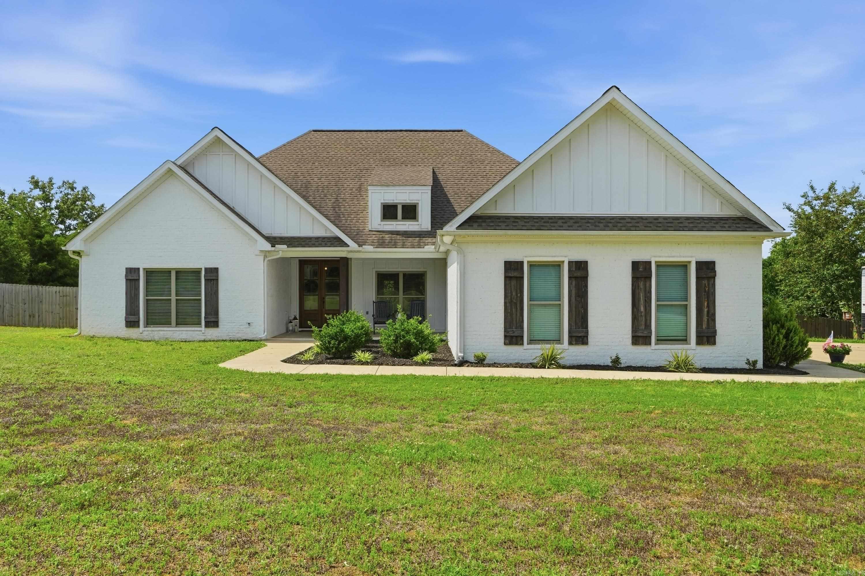 Like-new home without the new build price! Come experience the sought-after neighborhood of Coyote Ridge in Greenbrier. This beautiful 4-bedroom, 2-bath home sits on almost an acre and offers the perfect blend of modern comfort and peaceful country living.  Inside, you’ll find an open floor plan with stylish finishes, spacious living areas, and plenty of room for entertaining or everyday life. Step outside and enjoy the large yard, complete with a garden space perfect for growing your own vegetables or flowers. Home is complete with a 30amp rv hookup.  Located in a wonderful neighborhood with room to spread out while still being convenient to town, this home is move-in ready and waiting for its next owners. Don’t miss your chance to enjoy the Coyote Ridge lifestyle without the hassle or cost of building new!