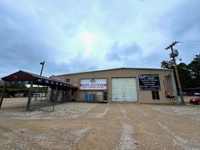 Commercial/ Industrial Opportunity on 6.5+/- Acres- Over 18,000 Sq Ft!  Discover endless potential with this expansive 18,000+ sq ft commercial/ industrial facility set on 6.5+/- fenced acres. Built for heavy-duty use, this property features thick concrete floors, multiple shipping and loading docks, and a large, detached shop. It offers exceptional functionality for manufacturing, warehousing, or distribution operations. Inside, the building includes spacious office areas, both upstairs and downstairs, a fully- equipped commercial kitchen, and three bathrooms. Outside you'll find a massive gravel parking lot, covered canopy area for loading or equipment storage, and secure perimeter fencing for peace of mind. With room to expand and infrastructure ready for high-demand operations, this property is a rare find for investors and business owners alike.    Call today for more information or to schedule a showing!