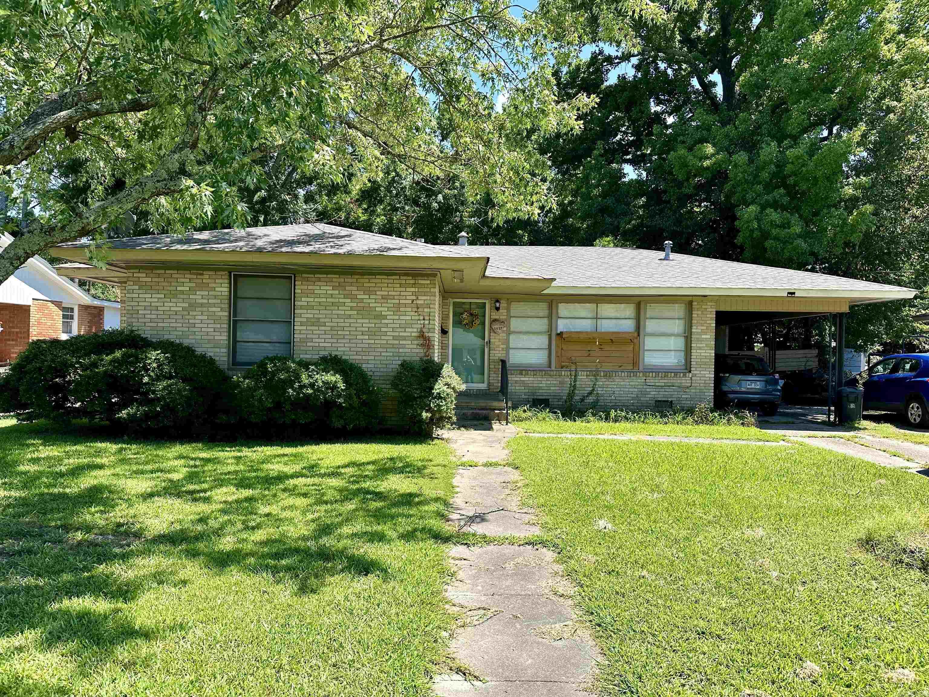 Come see the character in this charming 1954, 3BD/1.5 BA home! All 3 bedrooms are large with 2 of them having double closets to give you extra storage space. The original hardwood floors throughout the home have been very well maintained. The bathrooms have original tiling that provide you that eye-catching appeal. The living area has a gas log fireplace with built-ins to give you a welcoming atmosphere. Roof, water heater, additional attic insulation and furnace are less than 5 years old!! See agent remarks!