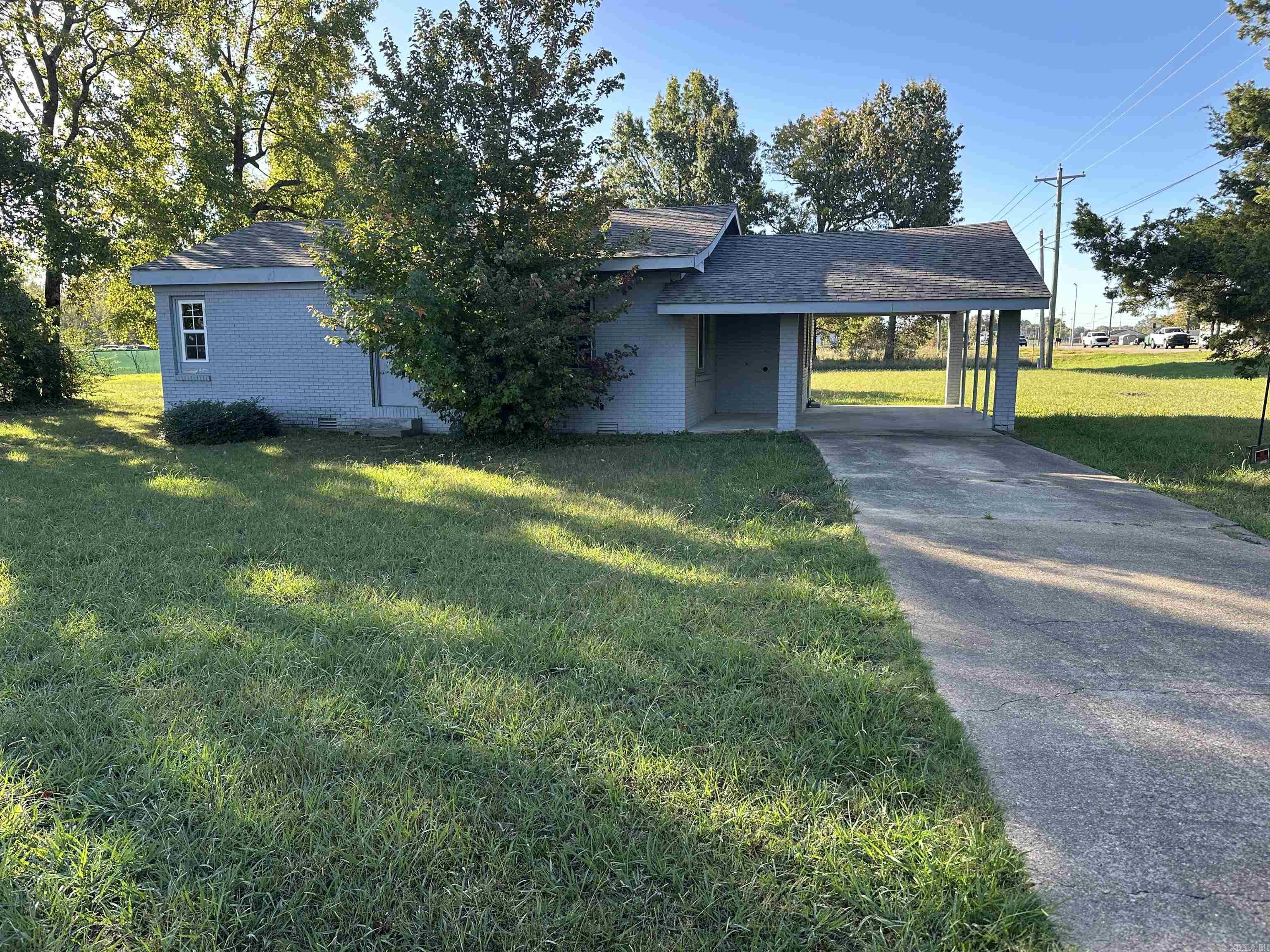High traffic commercial property off of Red Wold Blvd. On .96+/- of an acre with building that has great potential. Building is all brick with new windows.