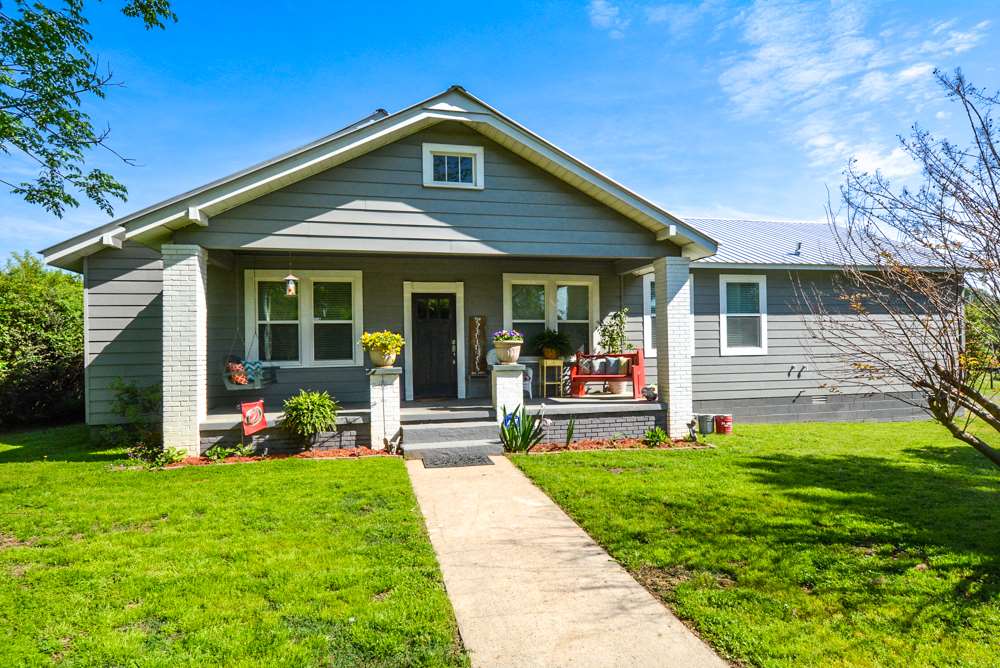 BEAUTIFUL FARM HOUSE WITH 5 ACRES/POND/BARNS/ARENA!!!! 3 bd/2ba home. 2015-1000 sq ft added to the original home. Master suite & master bath w/ granite counters, copper bath tub, sep walk-in shower.Brand new kitchen w/granite counters, farm sink, stainless steel appliances,beautiful flooring & lighting. Two living areas. So many updates!!! Pond, 2 barns w/electricity, lighted arena ALL fenced and cross fenced. Fruits trees/nut trees. This is a dream property located 5 min to Maumelle and close to town.