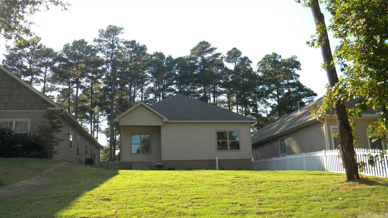 Garden/Patio Home in The Arbors at Andres Place! New Construction! Affordable Garden Home!  Beautiful Setting on a Hill!  Features: granite countertops in kitchen and baths. Wood flooring in Living area. Tile in wet areas. Carpet in Bedrooms. Master Bath has double vanities, jetted tub, separate tiled shower, walk-in closet. Tray ceilings! Great Floor Plan! Lawn maintenance is included in the POA dues.