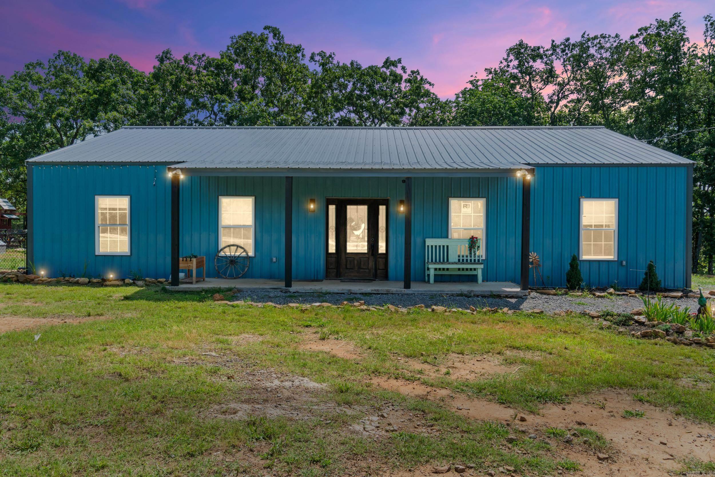 Escape to the peace and privacy of country living with this beautiful 3-bedroom, 2-bath barndominium situated on 9 picturesque acres in Bald Knob. Built in 2024, this home offers the perfect blend of modern comfort and rural charm. Inside, you'll find an open-concept floor plan with spacious living areas, a well-appointed kitchen, and plenty of natural light throughout. The primary suite provides a relaxing retreat, while two additional bedrooms offer flexibility for family, guests, or a home office. Step outside and enjoy endless possibilities on 9 acres of open space—perfect for livestock, recreation, gardening, or simply enjoying the scenic views. Whether you're looking for a peaceful homestead, hobby farm, or room to grow, this property delivers. Conveniently located with easy access to Bald Knob while still offering the tranquility of country living. Don't miss your opportunity to own this one-of-a-kind property! **Google has the street name spelled wrong. 113 Hudon Rdge Bald Knob AR 72010 will get you there.**