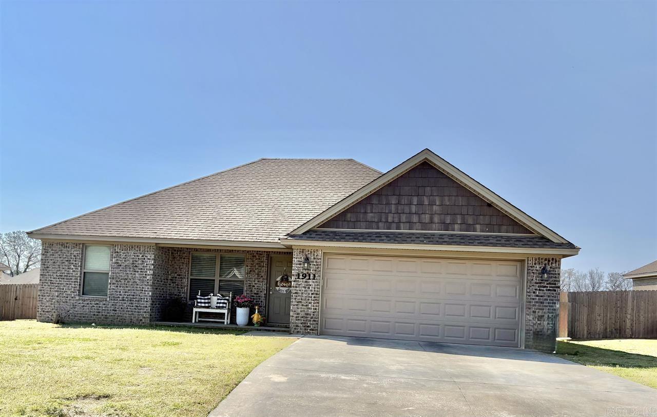 This spotless home at 1911 Rehoboth looks and feels brand new. The inside is perfectly clean and features a nice open kitchen and living room with a pantry and pretty flooring. It has a split floor plan for extra privacy, including a primary bedroom with a big walk-in closet and a guest bath with a walk-in shower. There is plenty of storage throughout, including a two-car garage and some floored space in the attic. Outside, you will find a large, privacy-fenced backyard with a nice patio and gates on both sides of the house. With blinds already installed and everything in great shape, this home is completely move-in ready. Agents see remarks