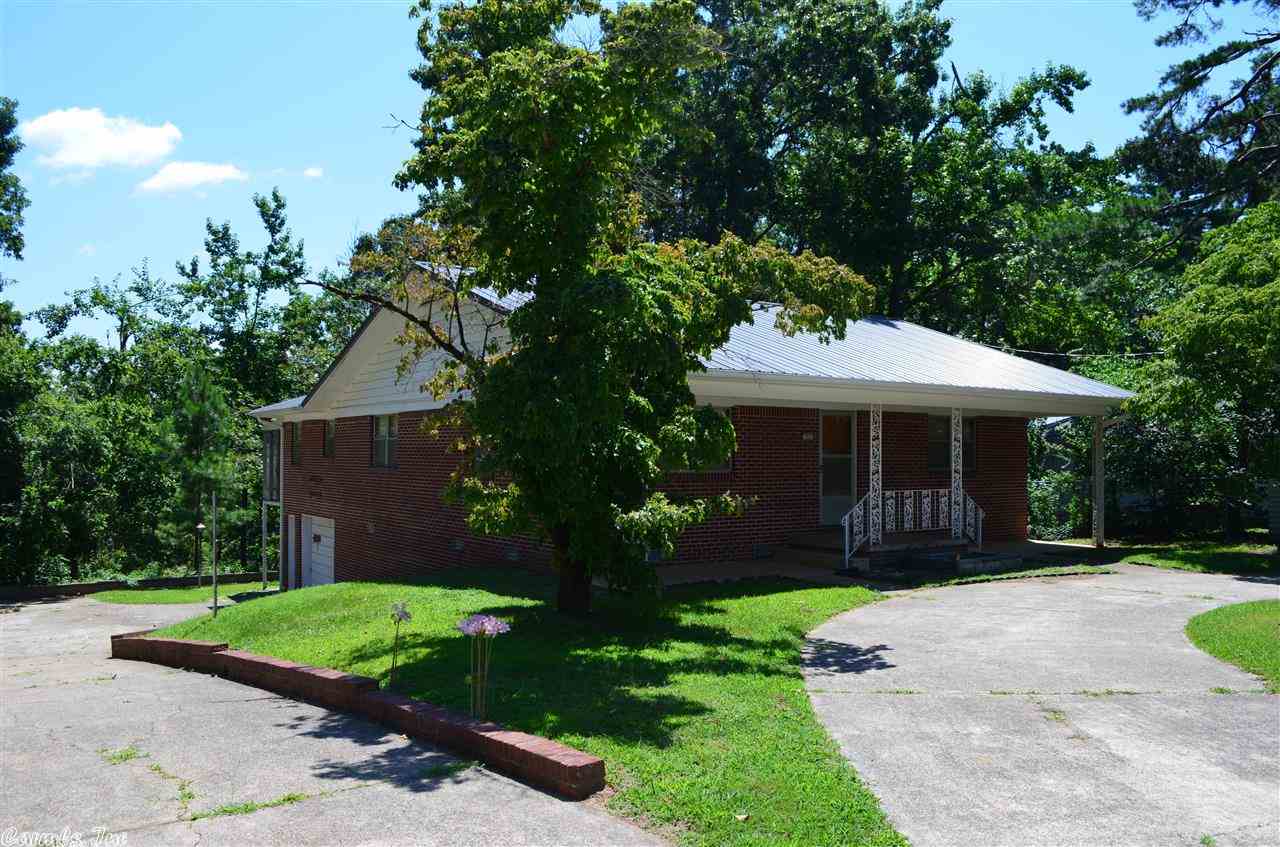Large rooms, dining room and breakfast room.  Walk out basement with washer and dryer hook-ups.  Attic fan, new roof (metal) and CH&A heat pump in 2012. Single garage with auto opener.  Hot tub and screened porch