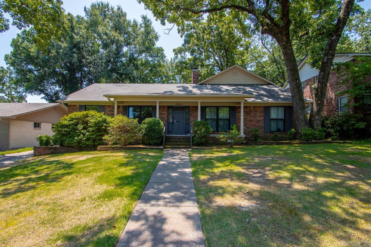 Beautifully updated traditional brick home offering 4 bedrooms, a dedicated office space, 3 separate living spaces (2 down and 1 upstairs bonus/flex space) & 4.5 baths, with 2,818 square feet of well-designed living space. Extensive renovations completed in 2021 include new windows, interior paint, added full bath & dedicated laundry room, luxury vinyl plank flooring, refinished hardwood floors in the bedrooms, & a stunning kitchen remodel featuring custom cabinetry, updated countertops, stainless appliances, & a pantry. Exterior fascia & soffit were freshly repainted in 2026. The functional floor plan offers generous living space with abundant natural light & excellent storage throughout. Enjoy the convenience of a rear-entry 2-car carport with additional storage. Ideally located just behind Williams Magnet School, providing easy access to playgrounds & basketball courts. This is a very quiet one-way street with not a lot of traffic which is also convenient to shopping, dining, medical facilities, & all that Midtown has to offer.