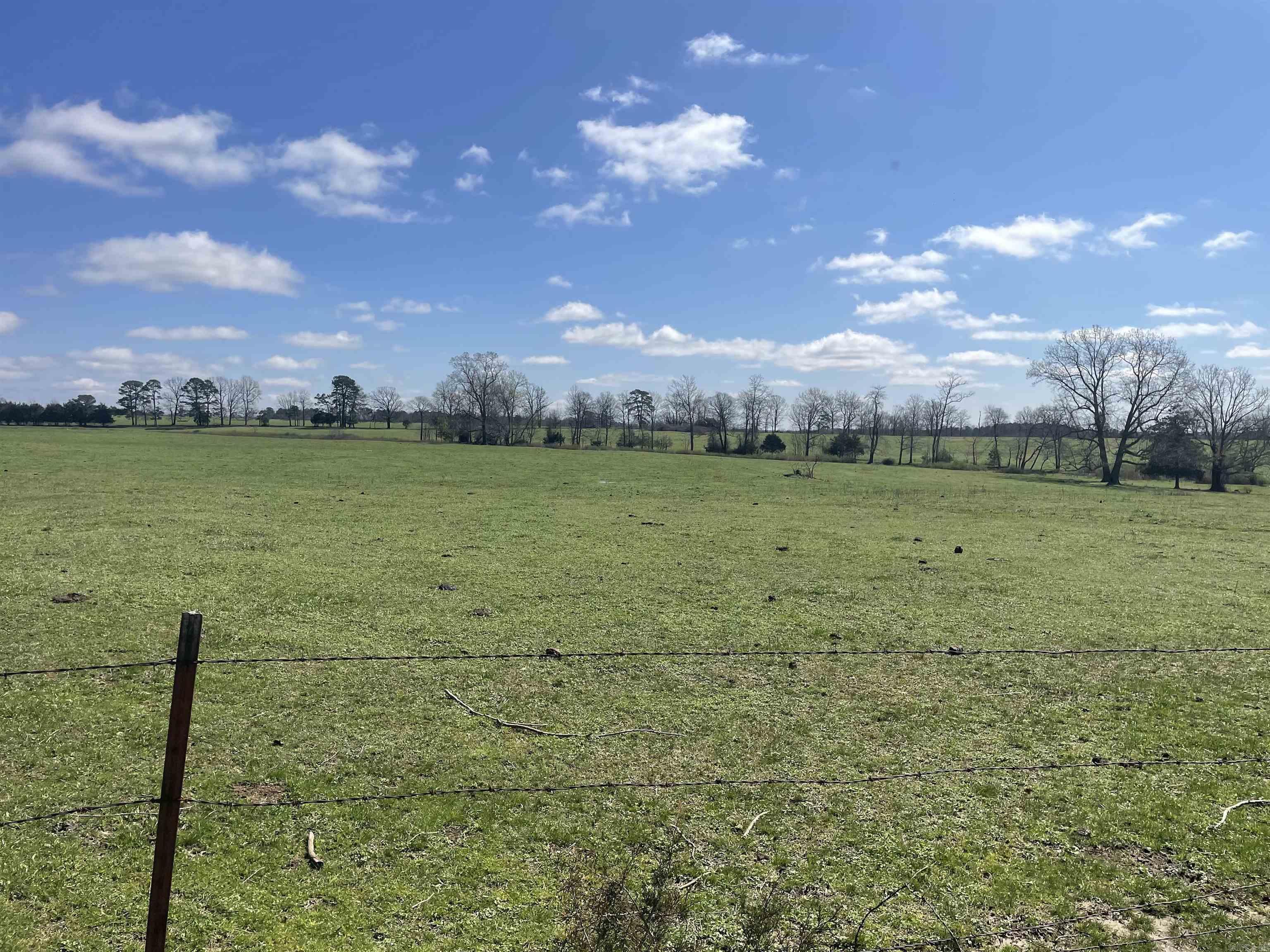 This is newly subdivided property is split into 3 and up to 11 acres  This is gently slops with rural water and First Electric power.  Some lots have water features such a spring feed ponds, some have trees and some are open.  Take a look today and call me for further details.