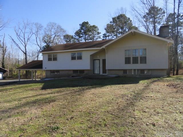 Looking for acreage close to everything!!! Come take a look today!! This split level has a heated and cooled basement area for workshop!! The downstairs bonus room could be an extra bedroom. Kitchen has double ovens and lots of counter space. There is a sun room to enjoy the nature that abounds. The great room is very spacious with a wood burning fireplace. Bedrooms are all up except for the bonus (which can be a bedroom) Outside storage building has electricity!! Don't miss this one!!!