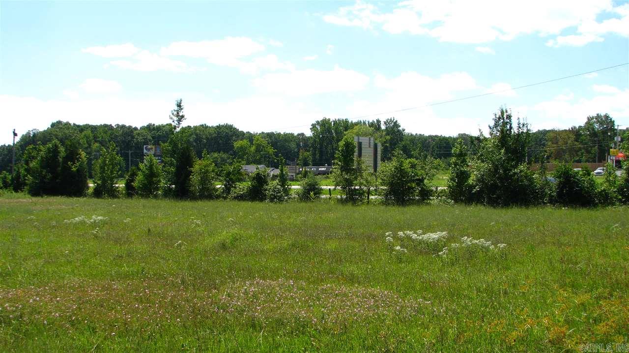 Great visibility from 67/167.  175' of frontage, level and mostly cleared.  In addition to this lot, there is 1 more lot available with 3.80 acres.  Parcels begin on Southern boundary of Wild Hog Liquor Store and continue to Northern boundary of former Busy Bee location, (now a car lot).  City water, commercial zoning in place.