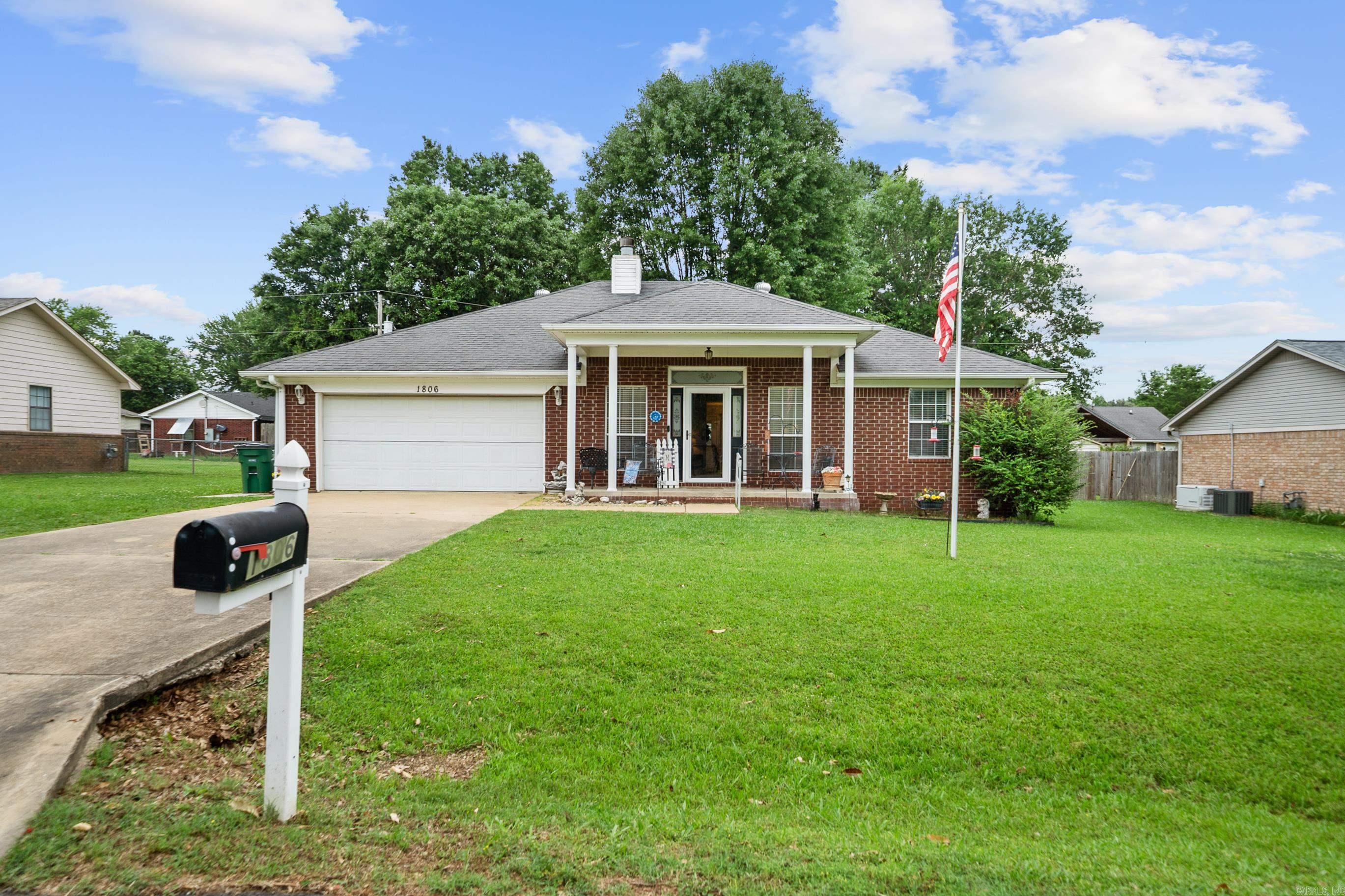 Welcome to this charming 3 bedroom, 2 bath home in the heart of Beebe! This well maintained home features an inviting open concept living, dining, and kitchen area creating the perfect space for everyday living and entertaining. The kitchen offers oak cabinets, abundant counter space and plenty of storage for all your cooking needs. The living room has original hardwood floors and a cozy gas burning fireplace. The welcoming front porch invites you inside while the back porch leads to a well maintained yard and a spotless 12x24 outbuilding complete with electricity and storage areas ideal for your workshop or hobby space. This home has been lovingly cared for and is ready for its next owners. Call today to make this wonderful property your new home!