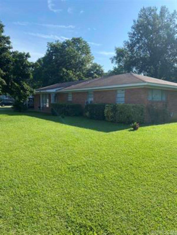 Almost 1/2 acre of .48 of an acre.  Just got the city to approve the replat. Big lot with two lots put together. Great place to put in another house, shop, swimming pool, or garden.  Zoned R-2A.  Home being sold as is.  Home has good bones.
