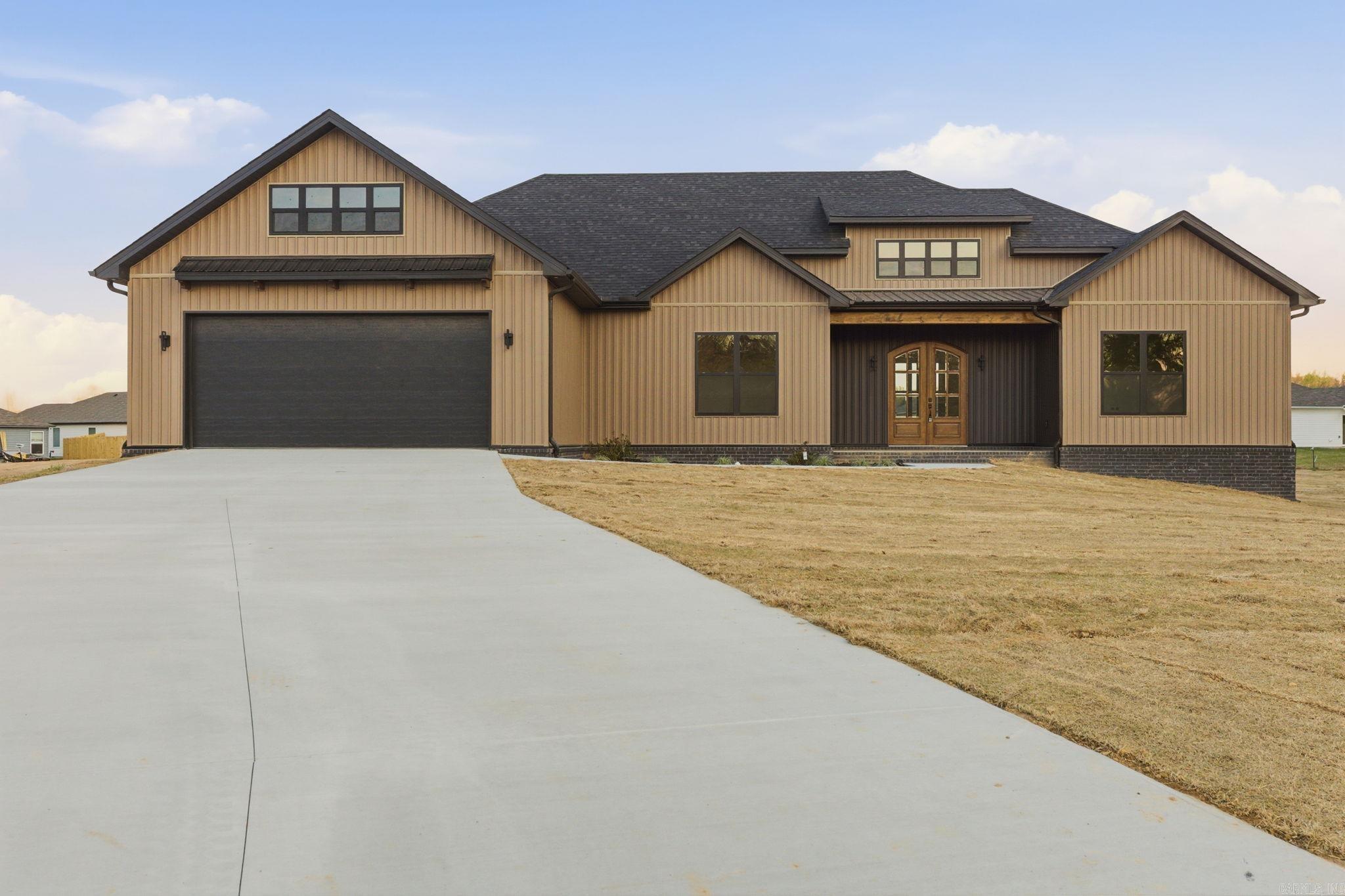 This modern new construction home is now complete!!!! Designed with an expansive open-concept layout, the living room, kitchen, and dining area flow seamlessly together. A large waterfall island anchors the space, complemented wooden beams and staple lighting. Stone pendant lighting and a statement wood chandelier add warmth and architectural interest throughout.  The split floor plan offers privacy and functionality, along with a convenient half bath for guests. The primary suite feels truly spa-like, featuring a stunning tiled walk-in shower, soaker tub, dual vanities with knee space, and an oversized closet complete with built-in dressers.  This home offers flexible living options—either a four-bedroom layout or three bedrooms with a dedicated office. Additional highlights include a butler’s pantry, a functional locker/drop zone area, and a spacious laundry room with room for a folding table and hanging rack.  Enjoy outdoor living on the large covered back patio with a cozy fireplace—perfect for entertaining or relaxing year-round.