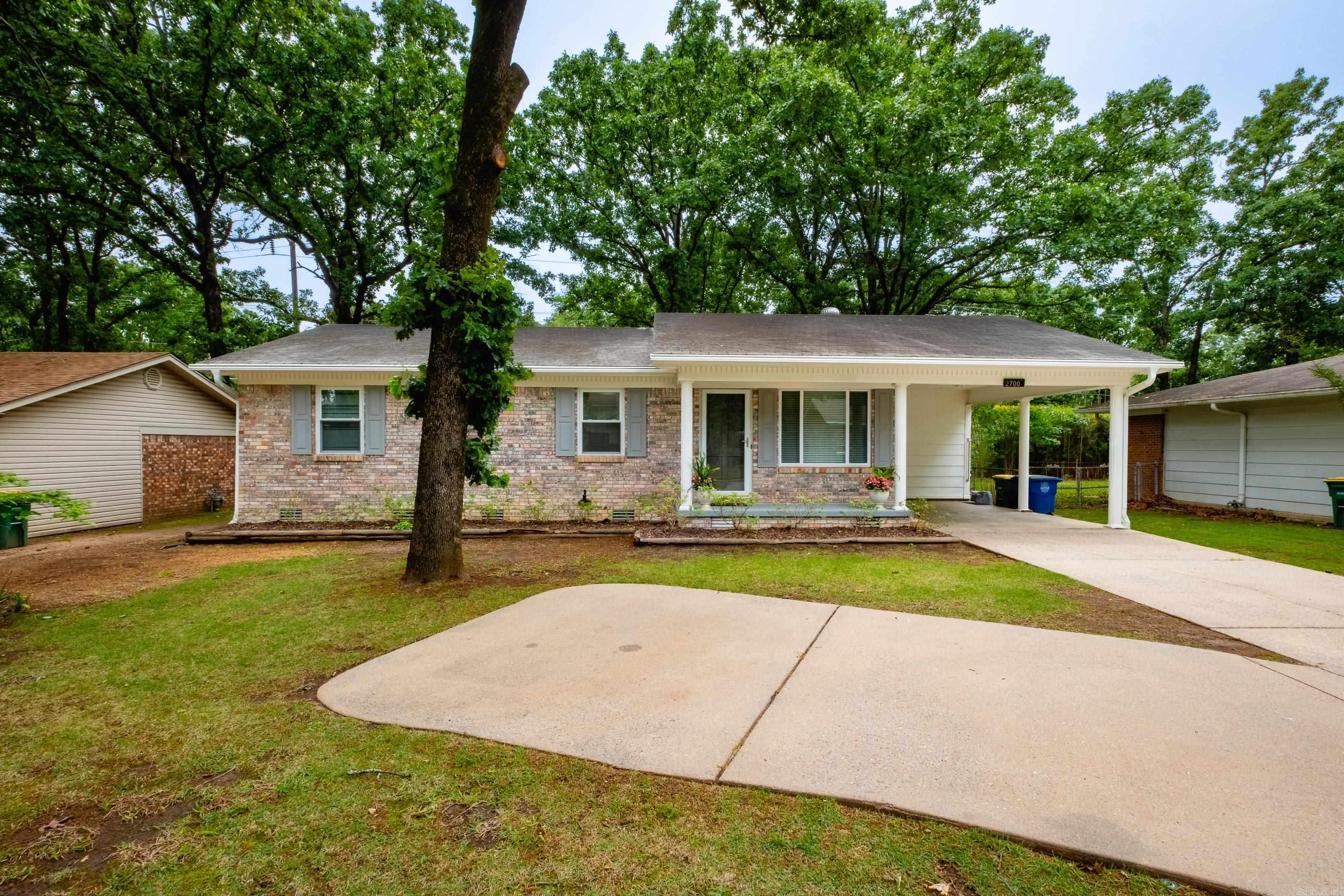 Precious one level brick home on Seminole Trail featuring 3 beds, 1.5 baths, freshly painted interior and original hardwood floors. Insulated windows and doors, sprinkler system, fully fenced flat backyard and covered parking with an additional parking pad. All appliances convey.