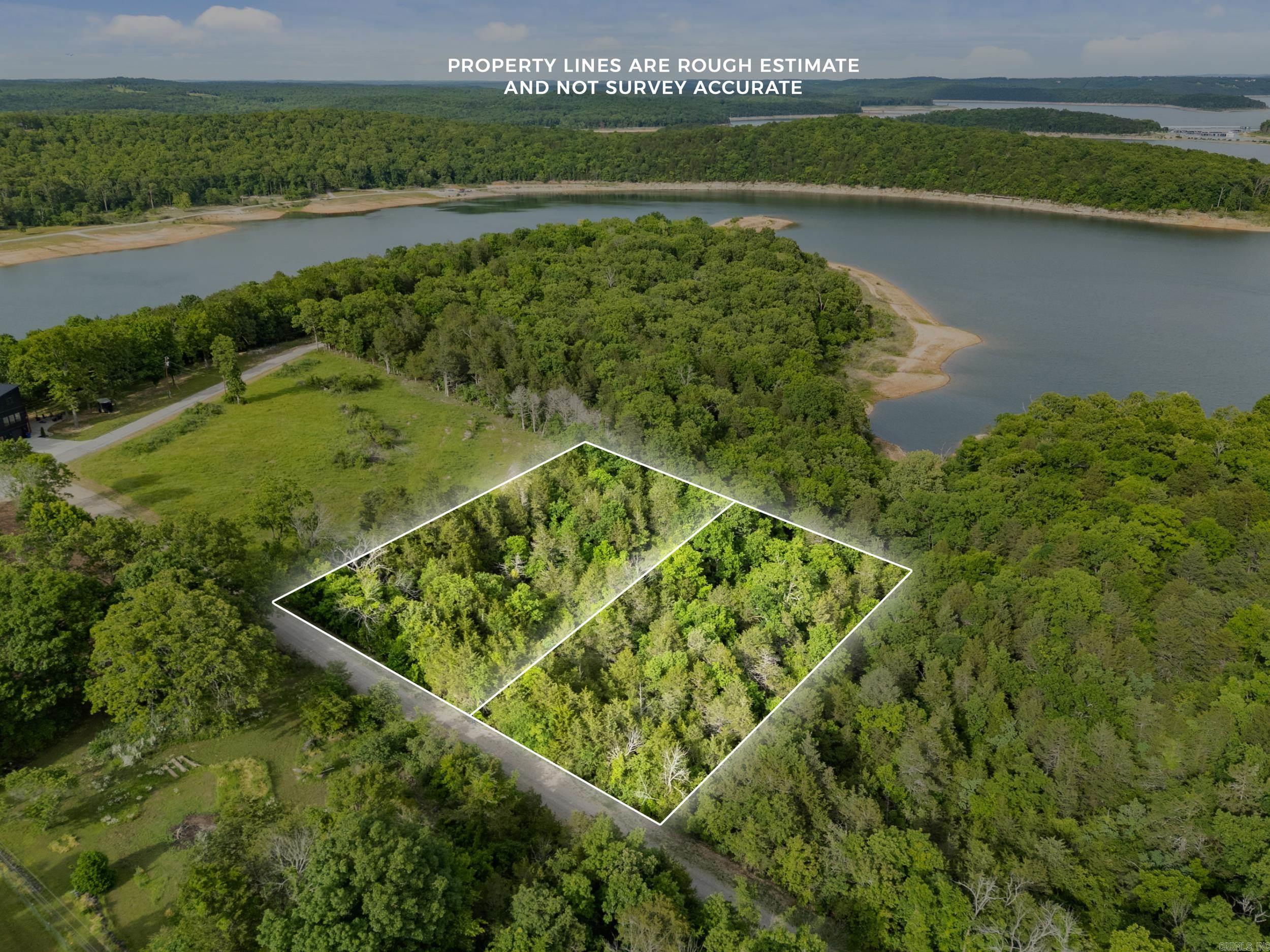Own your own piece of the Ozarks with this approximately 0.68 acre m/l lot featuring stunning year-round panoramic views of Norfork Lake. Ideal for a dream home, weekend getaway, or investment property, this scenic setting offers beauty, privacy, and long-term potential.  Located just minutes from Pigeon Creek Park and boat ramp, you’ll enjoy quick access to boating, fishing, and outdoor recreation. The property also borders U.S. Army Corps of Engineers land, helping preserve the natural surroundings and adding extra privacy. A rare opportunity to own lake-view property in a highly desirable area.