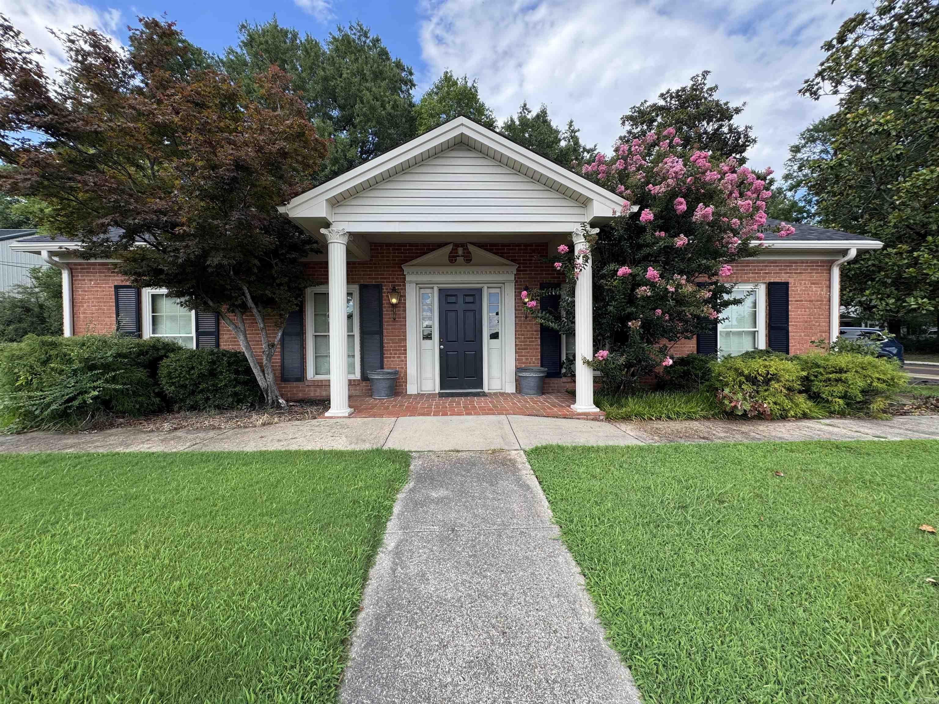 Prime Commercial Opportunity in the Heart of Piggott!  Position your business for success with this well-maintained professional office building located at 325 W. Jackson Street. Offering approximately 1,225 square feet of functional office space on a 0.24± acre corner lot, this property has long served as a medical office, making it an excellent opportunity for healthcare providers, professional services, or a variety of commercial uses. Built in 1970 and zoned C-1 Commercial, the building features a practical layout that can easily accommodate private offices, exam rooms, reception space, or collaborative work areas.  Conveniently located with excellent visibility and easy access, this property provides ample potential for owner-occupants or investors seeking a quality commercial asset in a well-established area of Piggott. Whether you're expanding your practice, launching a new business, or adding to your investment portfolio, this versatile property is ready to meet your needs.  Schedule your private showing today and discover the possibilities at 325 W. Jackson Street!