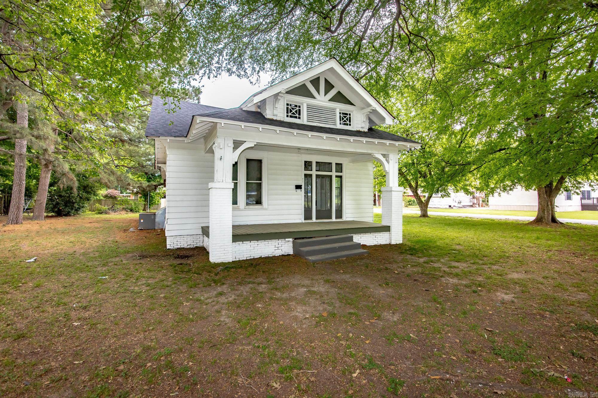 Bought and remodeled.  Further remodeling has just been completed.  New kitchen cabinets and stone counter tops have been installed.  Come back and see the new work. New roof, Central unit only a few years old, new laminate on the floors and paint job inside and out. Corner lot