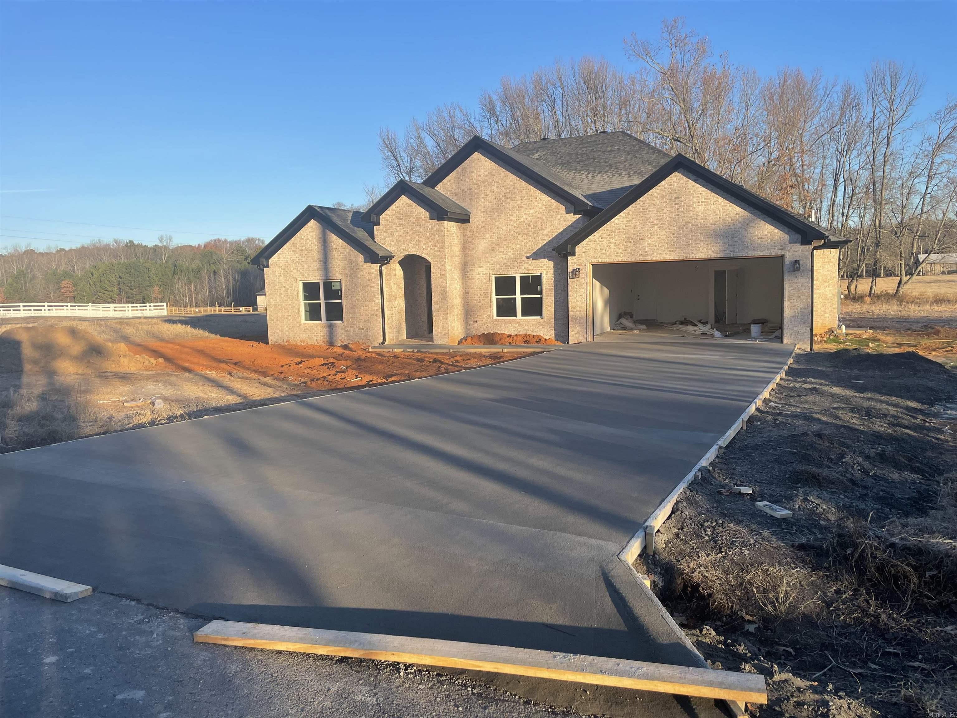 NEW CONSTRUCTION...PRIVACY, SPACE, LOW RESTRICTIONS...Stunning 4-bed, 2.5-bath, Approx 2,385 Sq Ft home Foyer, an ultra open concept, covered front & rear Porch, walk-in laundry, nicely sized bedrooms, kitchen, dining, granite counters, luxury vinyl plank floors, w/split floorplan for bedrooms, & all located on 3+ acres just 10-minutes from town. Fall Completion Planned.  Active Construction Site - Use Caution when onsite. Pics and Video of prior builds available upon request. As build progresses pic updates will be added.  Final build is final configuration - these notes are subject to change as build completes. See Agent Remarks.