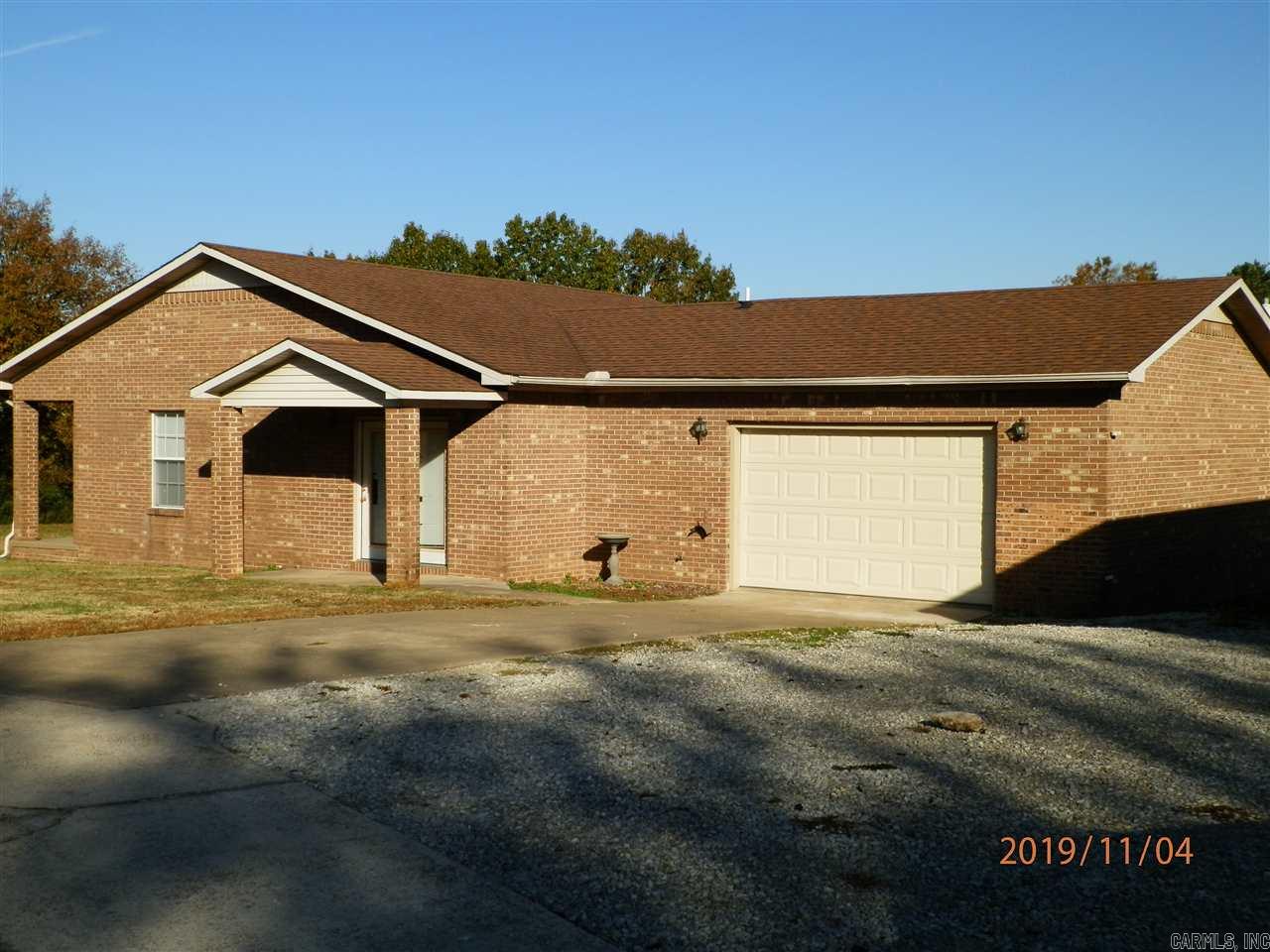 Nice home with open living/dining/kitchen area, separate laundry room and wide one car garage with storage room. Large unfenced yard. Stove and dishwasher furnished. Fridge not furnished. Shop next door is not included with rental. No pets. Not on HUD Section 8. Minimum six month lease required. . Application is required.