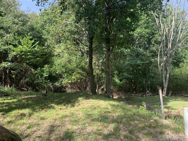 Property listed are lots 12 & 13 being sold together. Both lots together are a total of 60 x 130.  These are vacant city lots with city electricity, water, gas, and sewer available. Lots are up on high end of a dead-end street.  The property is just minutes from downtown Hot Springs area shops, eateries, Bath House Row, the Hot Springs, Oaklawn Race Track, and other downtown activities. Great area for a small home/bungalow style for low maintenance living or a rental.   No mobile homes allowed