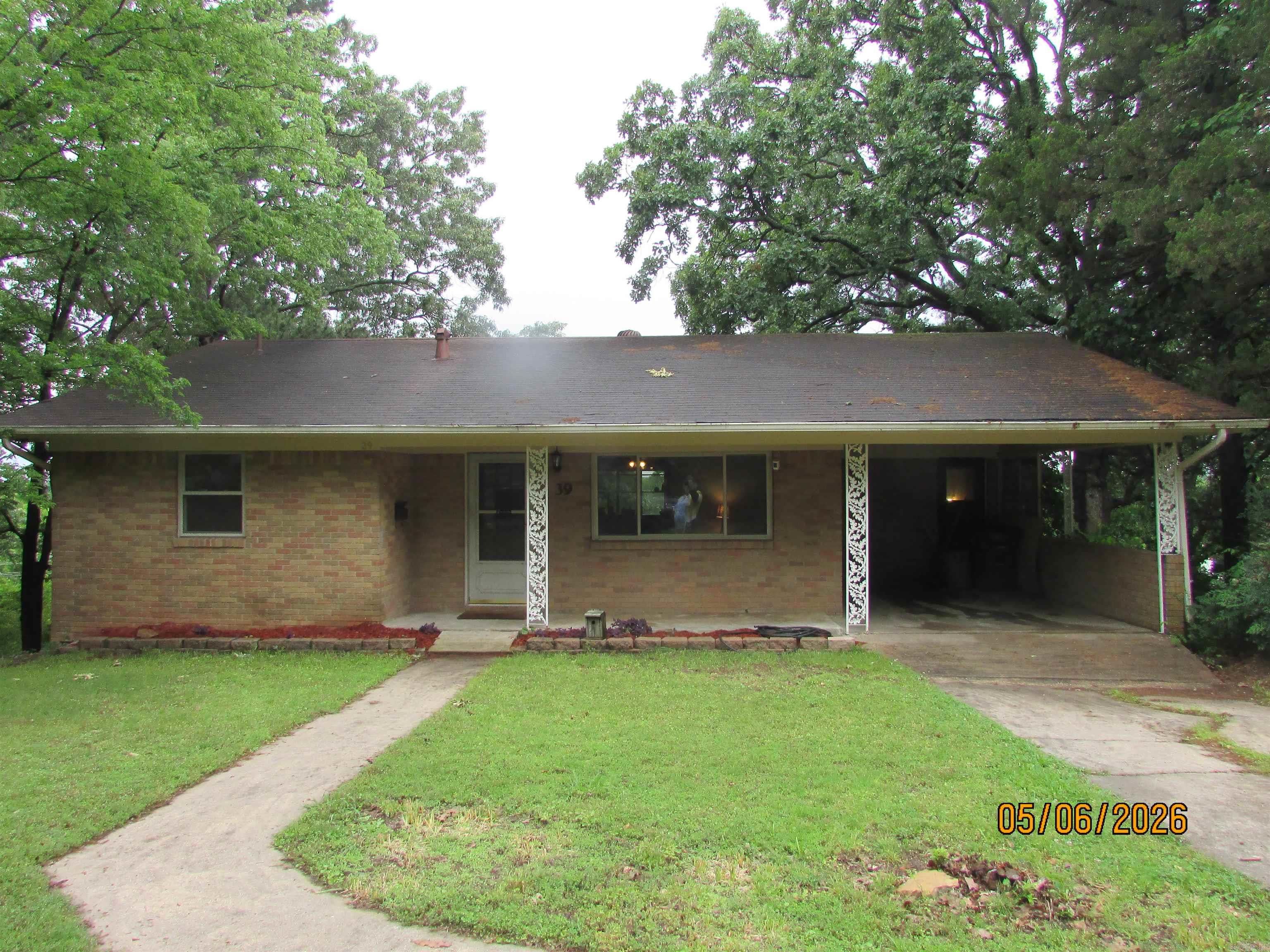Home with a view with so much potential! Whether you're looking for an investment home or one you can customize to your taste. This one is it! Main floor features living room, kitchen, dining, 2 bedrooms, a full bath and a screened in porch for relaxing after a busy day. Full basement has a bedroom, bathroom, laundry room with lots of storage and a huge den/game room with a walk out covered patio. Nice size back yard. So many possibilities. Pool table to convey. Call today before it's too late.