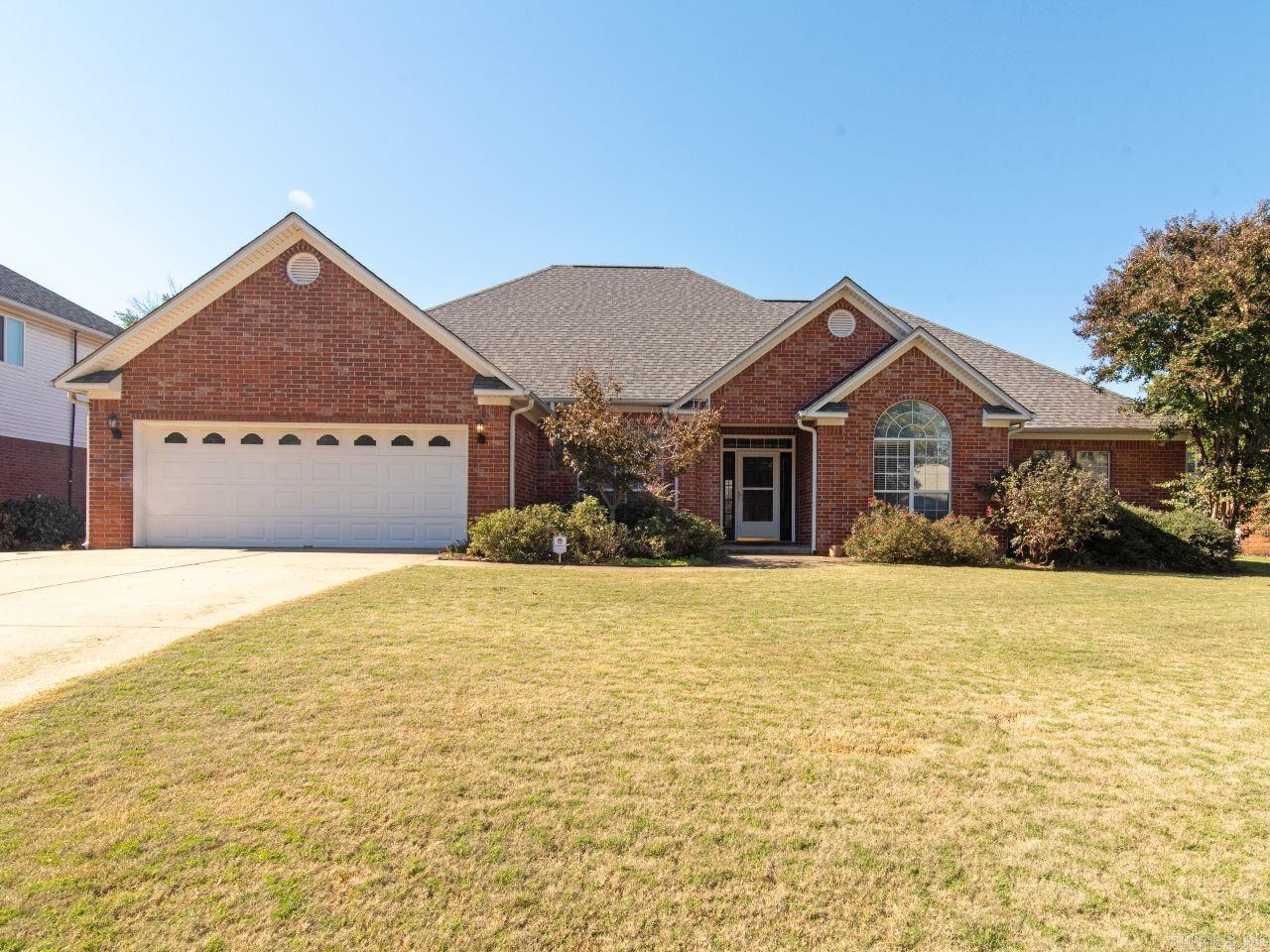Who's been waiting for a home in the Windcrest Subdivision?  You will love the location, close to the Conway Country Club, shopping and all Conway has to offer!  This beautiful four bed, 2.5 bath home is nestled in a very quiet cul-de-sac and is move-in-ready!  You will love the oversized backyard and screened in porch with a TV that conveys, plus and outdoor Kitchen that would be perfect for any cookout, equipped with cooktop and refrigerator.  Inside has fresh paint, new flooring in all bedrooms and hallway.  HVAC was new in 2023, roof was new around 2018.  Sprinkler system in front and back yard! Don't miss this one, schedule your showing today!