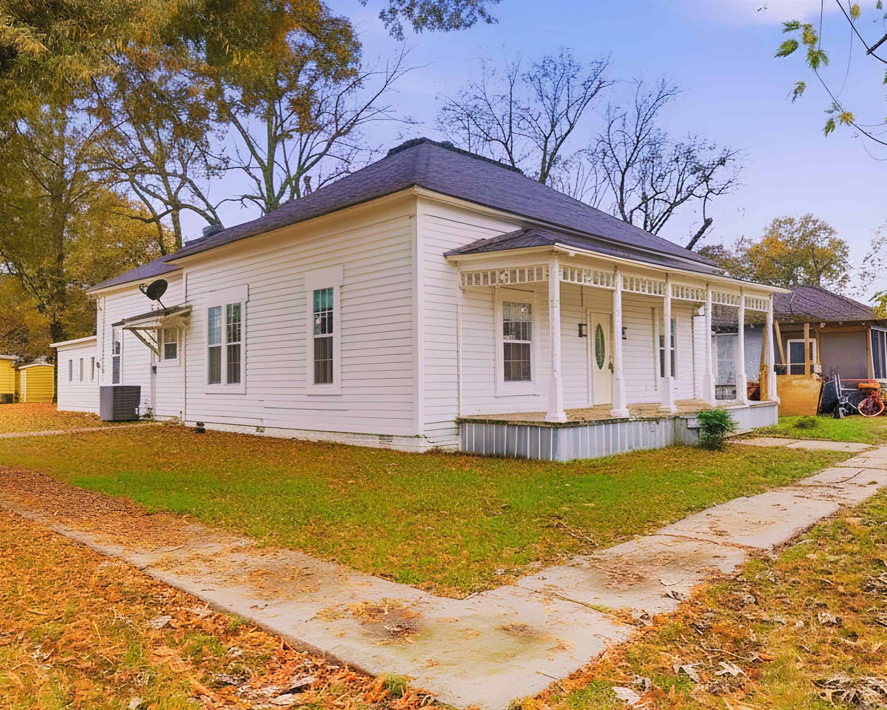 Situated on a spacious corner lot, this fully renovated home combines classic charm with modern updates. Inside, you'll find all-new flooring, fresh neutral paint, and an updated kitchen designed for everyday living. The formal dining room provides a great space for gathering, while the generously sized bedrooms offer comfort and flexibility. A separate laundry room adds convenience, and the inviting front porch is the perfect spot to relax and enjoy the neighborhood. Move-in ready with thoughtful updates throughout, this home is ready for its next owner to make it their own. The roof, HVAC, water heater, appliances, windows, bathrooms - ALL NEW and part of the renovation.