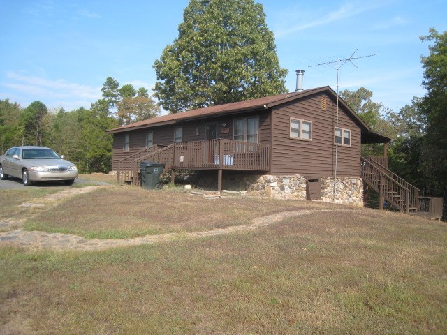 Bring on the horses! This 3BR/ 2 Bath home sits on 3.50 acres with pipe fencing, horse stalls, out buildings, cross fencing. Property is close to Lake Ouachita and only 10 minutes to bypass. Newer Heating and Air, detached garage. Reduced price! Owner motivated to sell!!!