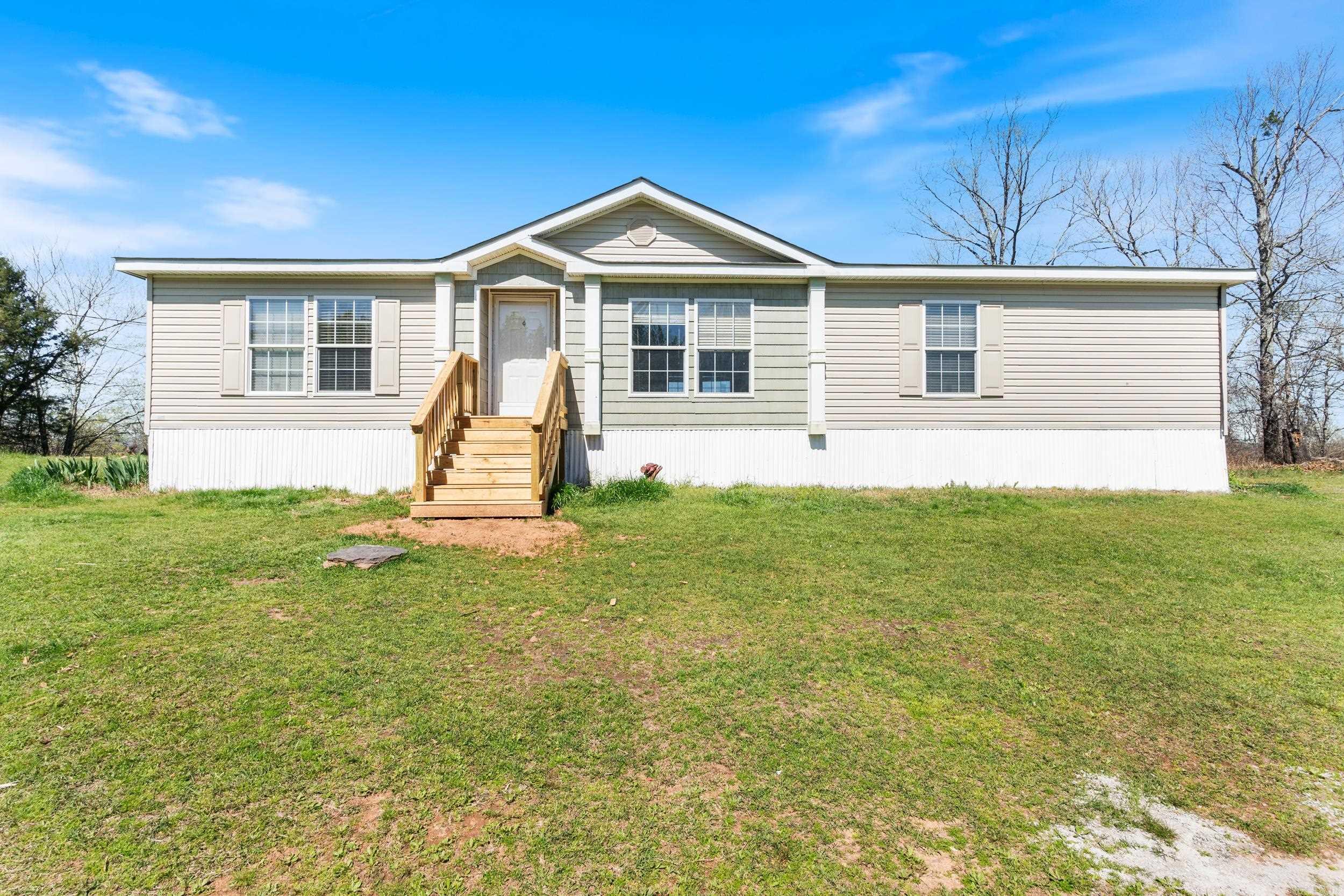 See the Drone Video here--> https://youtu.be/HkDJIQHEp3E   Welcome to  your almost 3 acre wooded wonderland! This charming, 4 bedroom, 2 full bathroom home on a permanent foundation sits atop a magnificent ridge with a vista view. It gives you the flexibility to enroll in either the Greenbrier or Vilonia schools, and is conveniently located 12 minutes from Greenbrier and 15 minutes from Conway. The open concept kitchen, inviting living room and private primary bedroom offers space for everyone. Embrace the natural beauty of the property, with lush woodlands extending all the way to the Cadron Creek. Recently updated, both the front steps and back deck enhance the charm of the residence. The sellers are very motivated and are open to negotiation. Come see this home today that has everything you need to make memories that will last a lifetime.