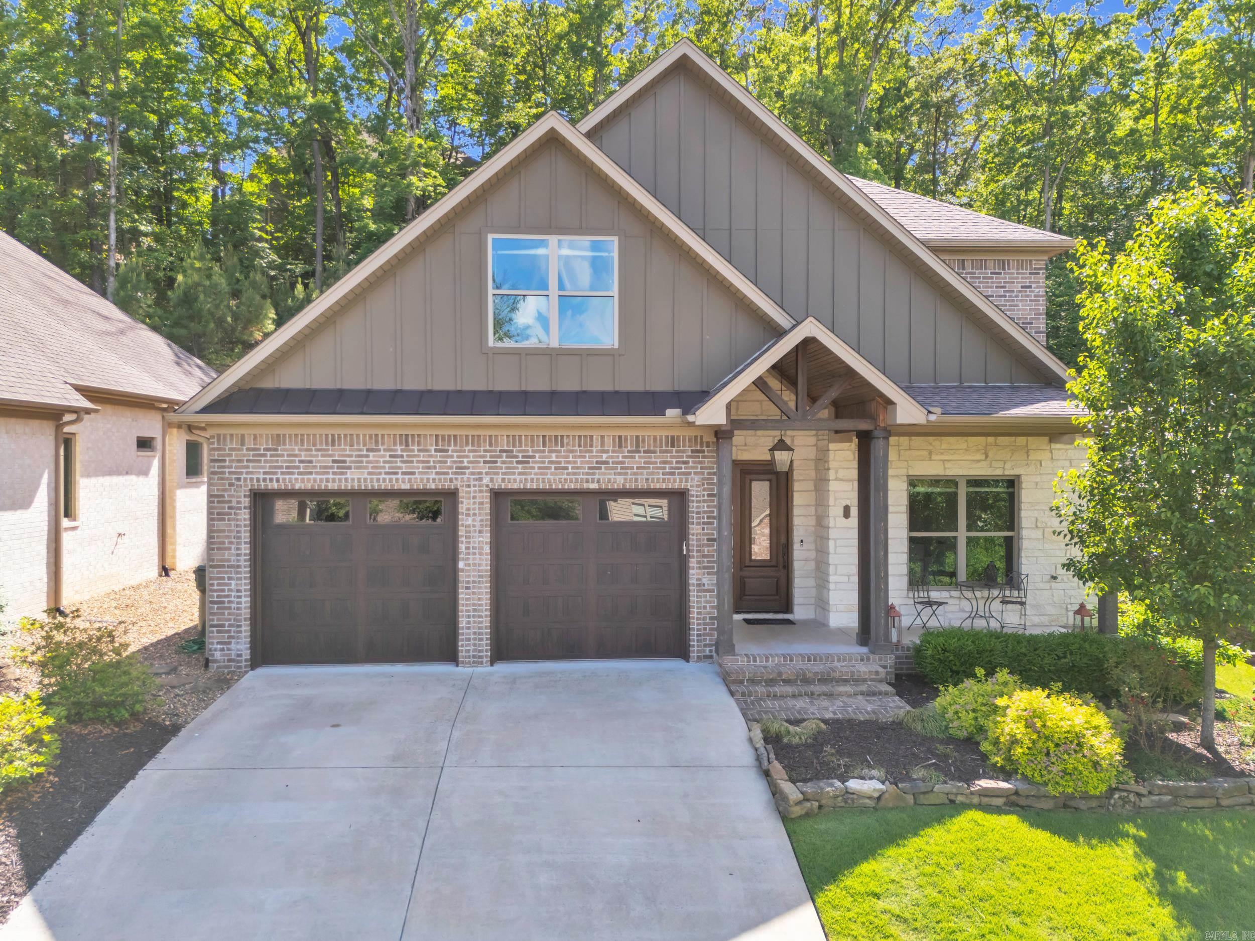As you drive into the gated cul-de-sac of the green, desirable Woodlands Edge, you will find nature, community, & your new 4BR/3BA home. AMENITIES: You are 5 minutes from the pool, clubhouse, tennis & pickleball courts, a playground, and picnic facilities! Woodlands Edge has a private lake built for fishing, and 6 MILES of hiking trails! BUILD: 2020 & impeccably maintained! Open floor plan, floor to ceiling windows, and protected greenspace behind you. What to look forward to? Prep meals on your massive granite island while watching the game. Relax in the primary bathroom, complete with a soaking tub, dual sinks, and an expansive walk-in closet. Entertain under your covered patio and curl up by the outdoor fireplace. Laundry is even a breeze when your laundry room is the size of this realtors bathroom. COME SEE THIS HOME TODAY!