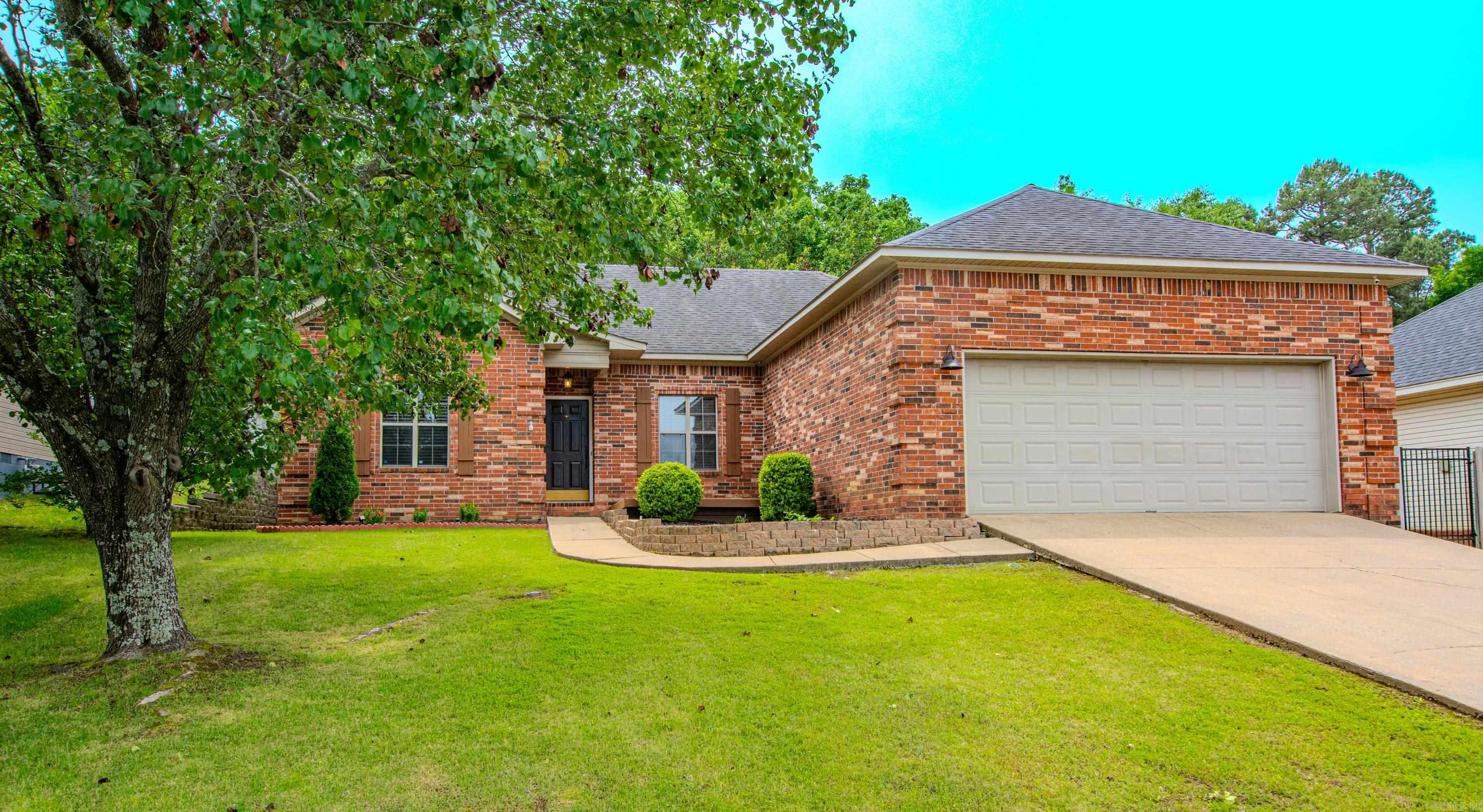 Welcome to this wonderful floor plan with 3 bedroom, 2 bath, one level, with primary bedroom a part from the other 2 bedrooms. The formal dining opens to the large living room which has gas log fireplace with glass screen.  Love the breakfast bar in the kitchen and in the hallway to the garage, it has a desk workstation and cabinets. Also has a lawn sprinkler system and ADT cameras will stay. The ring doesn't stay.  The two TVs stay with the house as well as the washer/dryer and refrigerator.  There is spacious decking on the back of the house which also has wiring for a hot tub. Solar panels are great addition to the home.  Seller will pay the panels off at closing.  Info upon request.   Agents see agent remarks.