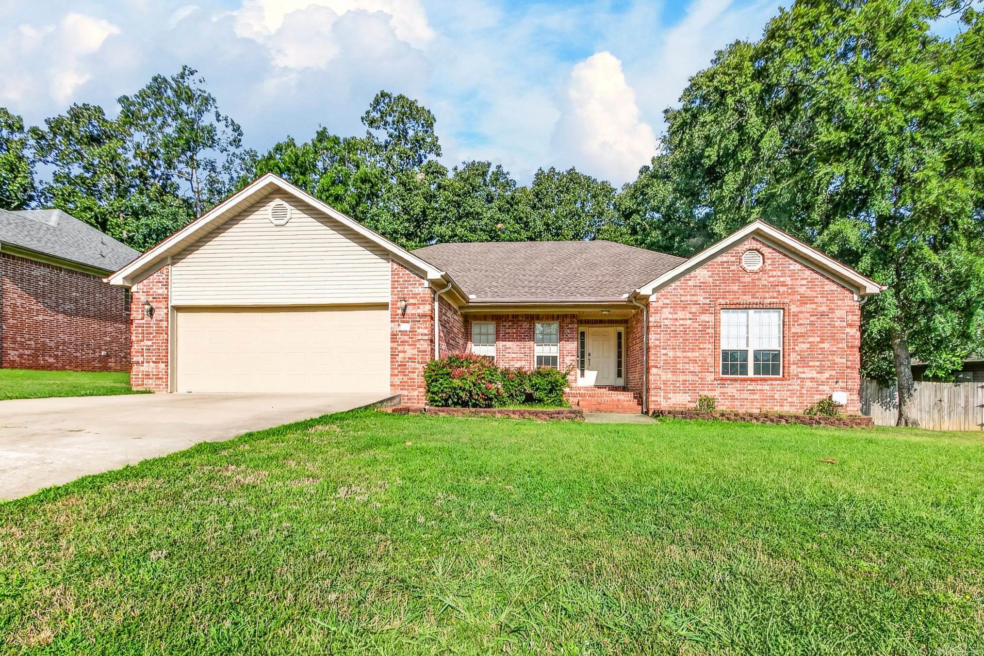 Welcome home to this beautiful 4-bedroom, 2-bath home in the desirable Magness Creek subdivision! From the moment you step inside, you'll appreciate the spacious entryway with a convenient coat closet that creates a warm and welcoming first impression. A formal dining room provides the perfect space for hosting family dinners and holiday gatherings, while the inviting living room features a cozy gas fireplace. The kitchen offers plenty of workspace and is tucked away from the main living area, complete with its own dining area for everyday meals. The spacious primary suite is a relaxing retreat with a tray ceiling, jetted tub, separate walk-in shower, and a large walk-in closet. Step outside to enjoy the oversized deck overlooking a fully fenced backyard with a 6-foot wooden privacy fence, making it the perfect space for entertaining, grilling, or simply relaxing. Conveniently located in Magness Creek, this home offers the space, comfort, and features you've been looking for. Schedule your private showing today!