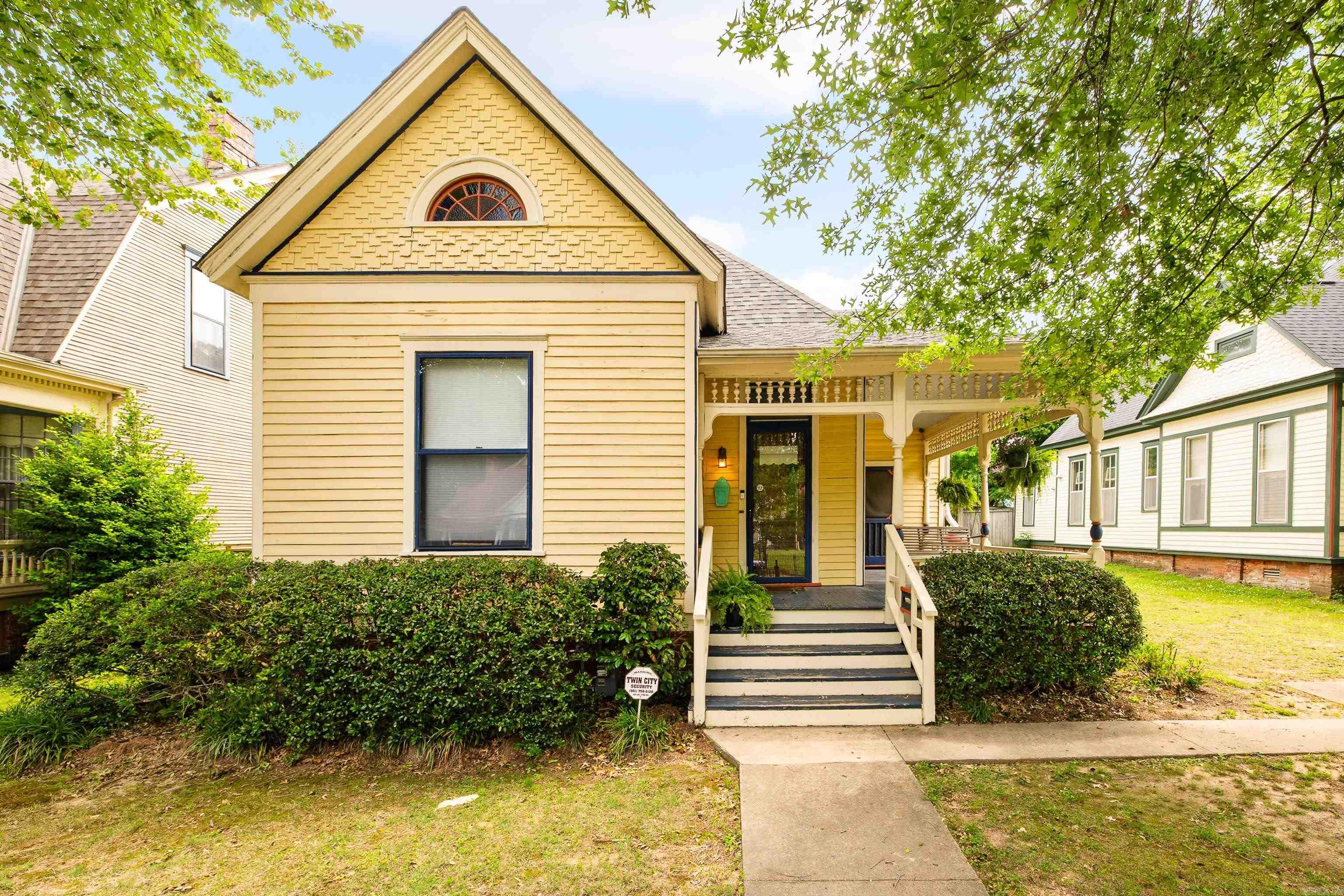 Tucked into the Governors Mansion District of Downtown Little Rock, The Thompson-Daniel House is brimming with charm and character!   Throughout the home, you will find modern updates alongside original stunning features, such as the refinished wood floors, high ceilings, picture railing, and functional transom windows. The artist who lovingly cared for and maintained the home for over two decades has breathed such life into the house with color in every room and beautiful landscaping surrounding the wraparound front porch and pergola that leads to the spacious and private backyard.   The Thompson-Daniel House feels open and welcoming the minute you enter, with great natural lighting and space to entertain. Easily walkable to all the attractions SOMA has to offer, this historic house has all the makings of a wonderful home for its next owners!*Please note, photos with furniture have been virtually staged.*