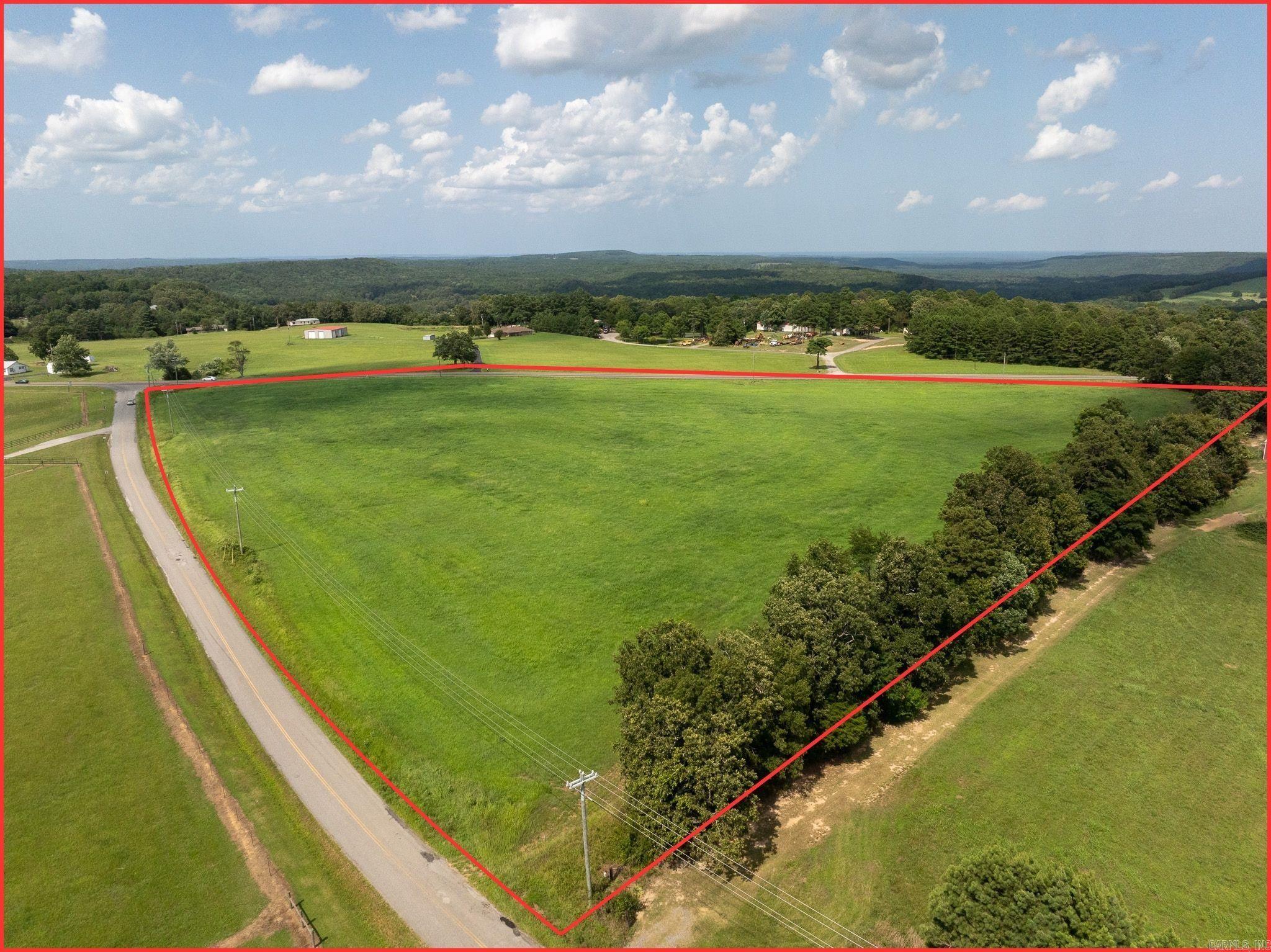 Discover the perfect setting for your dream small farm just west of Searcy. This beautiful property offers nearly a half mile of paved road frontage along both Highway 36 and Midge Langley Road, providing outstanding access and multiple entry points.  The land features an established Bermuda hay field that has been consistently maintained and harvested for several years, along with gently rolling terrain ideal for farming, livestock, or building your country home. Whether you're looking to start a hobby farm, expand your agricultural operation, or enjoy peaceful rural living, this affordable property offers endless possibilities in a highly desirable location.