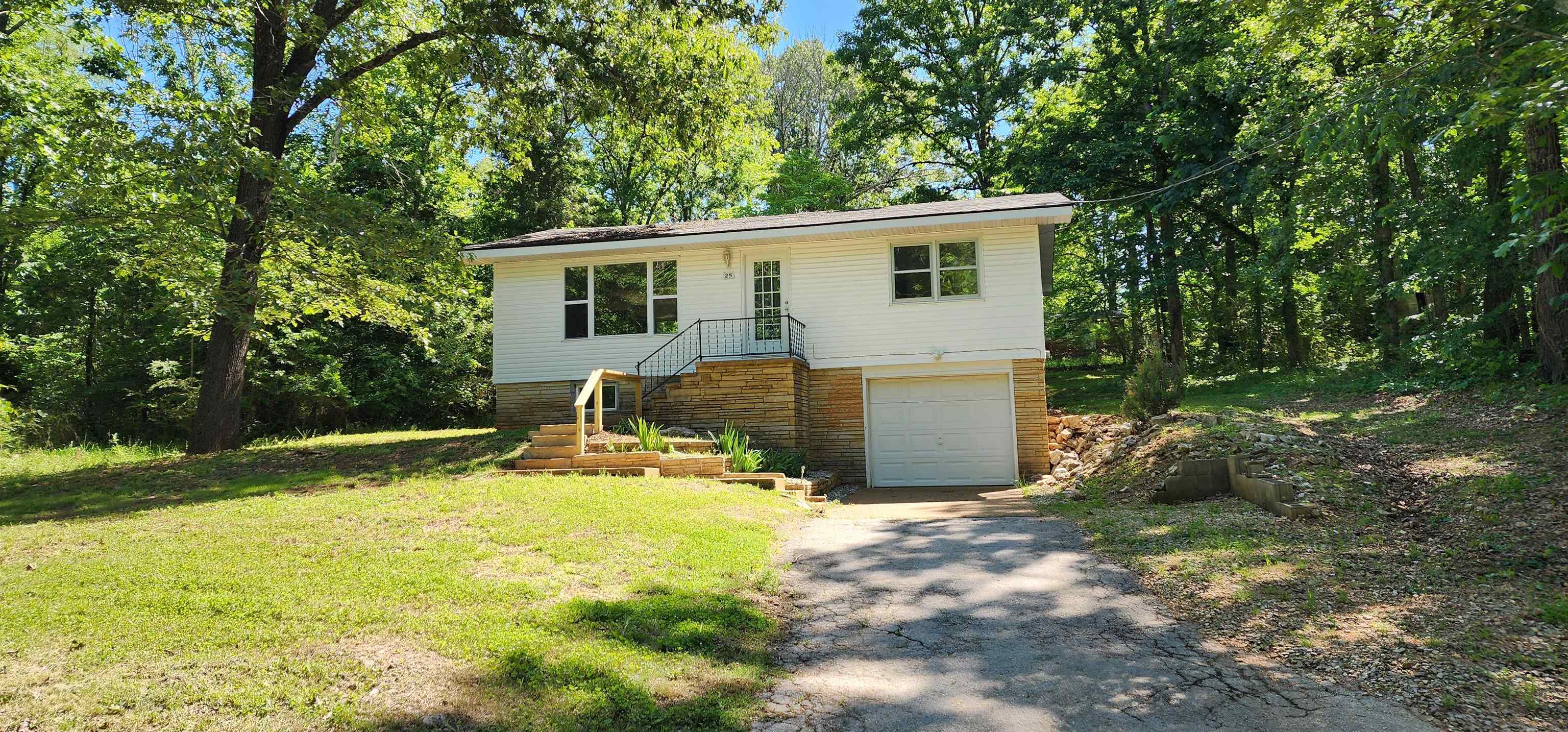 3 Bedroom  1 full bath with a bonus room.  Wood and vinyl plank floors.  Open Kitchen/dining/living room, 2 bedrooms, 1 bath on the upper level, 1 bedroom, den/bonus room and large laundry room on the lower level with an entrance from the garage.  Requires credit check/references, 1 year lease, security deposit.