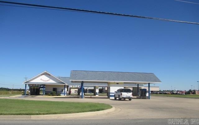 Car wash (560 sq ft) & heated & cooled office building (200 sq ft) sold before listed.