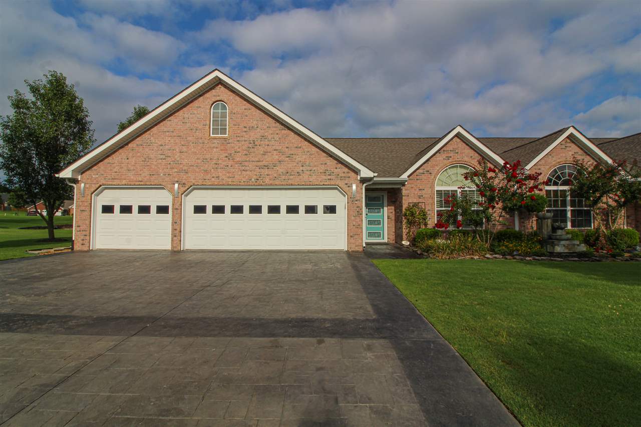 BEAUTIFUL ALL BRICK CONTEMPORARY CONDO ON THE POND W/HUGE SCREENED GAZEBO! THIS END UNIT WAS COMPLETELY GUTTED TO INCLUDE OPEN CONCEPT DESIGN WITH VAULTED CEILING, LARGE ISLAND,  DINING ROOM, AND FULL WET BAR. KITCHEN INCLUDES ALL NEW HIGH-END APPLIANCES. MASTER BED/BATH AND GUEST BED/BATH on MAIN LEVEL; THIRD BEDROOM ABOVE GARAGE W/INTERCOM. NEW LVP FLOORS, NEUTRAL PAINT COLORS AND PLANTATION SHUTTERS THROUGHOUT. CUSTOM BARN DOORS SEPARATE MASTER BED/BATH TO LARGE LAUNDRY ROOM. LARGE PATIO AND MORE!