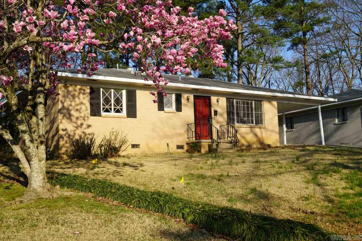 Close to everything! This cute one story, all brick 3/2 has hardwoods in bedroom and under carpeted areas. Kitchen-dining combo with glass doors to patio in fenced back yard. New AC compressor in 2010. Perfect home for first time buyers or investors!