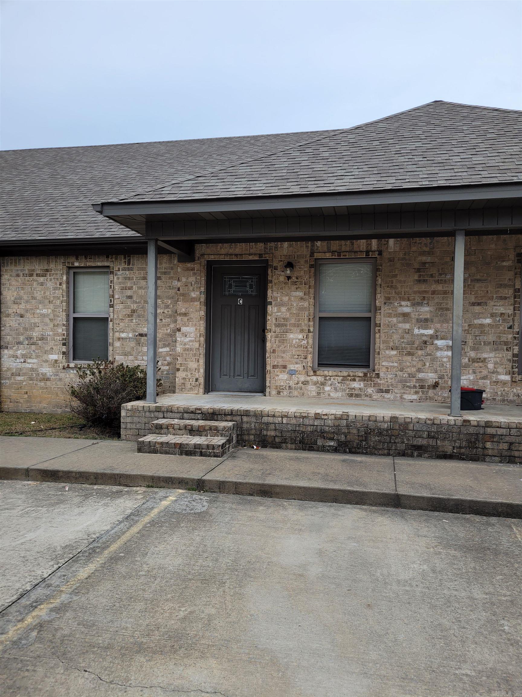 2 bedroom / 2 full bath unit available in downtown Cabot. This unit has stained concrete floors throughout, solid surface counter tops, and updated appliances. Cute front porch, good size for sitting and back patio. Back yard is communal with the rest of the units, thus no pets are allowed at this time. Rent is $775  Deposit is $775. Application fee is $40 per adult. NO PETS. Tenant pays all utilities. Lawn maintenance is provided.