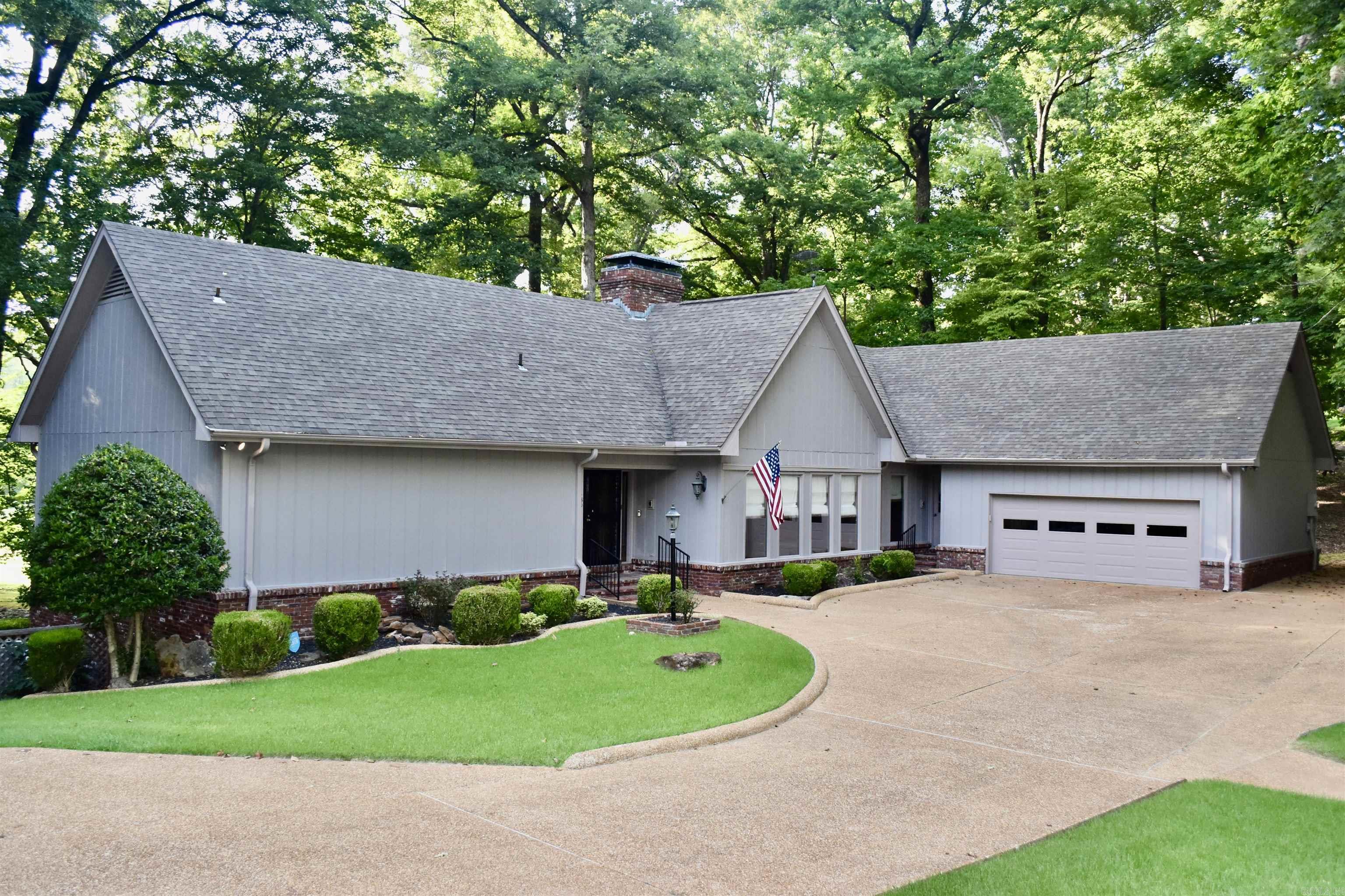 Enjoy premier golf course living on the #1 hole of Helena Country Club golf course in this beautifully maintained, one-owner home. Built in 1980 and lovingly cared for, this spacious 3,800 sq. ft. residence offers 4 bedrooms, 2 full baths, and 2 half baths with expansive living areas designed for both entertaining and everyday comfort. Step from your backyard directly onto the course, then take a short golf cart ride to the clubhouse, pro shop, pool, and tennis courts. Inside, you'll find soaring ceilings, abundant natural light, built-ins, oversized closets, ceiling fans throughout, and a large dining room with extensive display cabinetry. The primary suite includes walk-in closets, heated bathroom floors, and an updated walk-in shower. Additional highlights include a den/game room, an enclosed sunroom, a separate laundry room, built-in gun closet, and a spacious two-car garage with ramp access. Outside, mature trees, extensive landscaping with beautiful rock features, a sprinkler system, mosquito misting system, and a large deck create an exceptional outdoor retreat.
