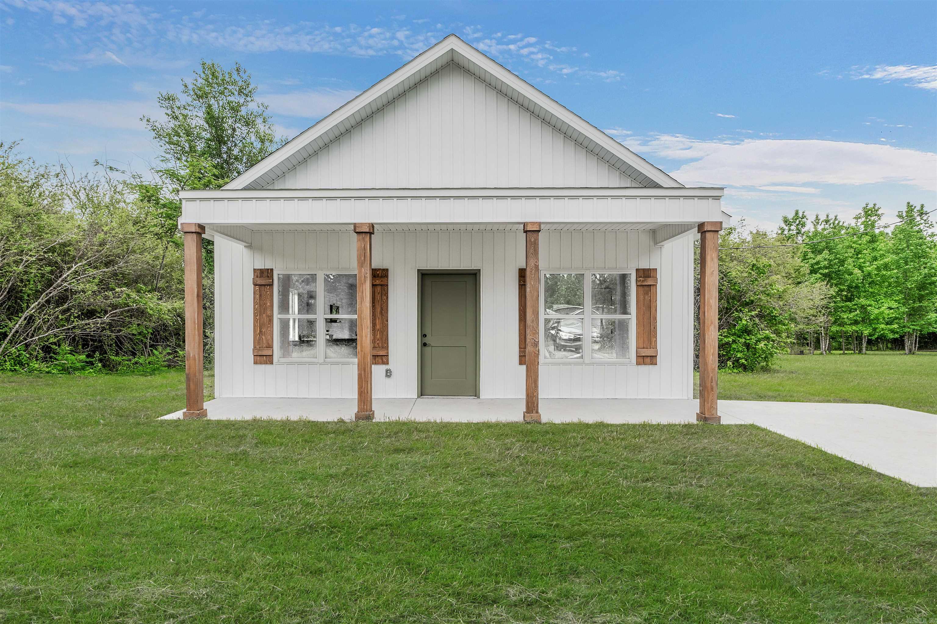 Charming rural retreat on approximately .75 acres in Ward! This 2-bedroom, 1-bath traditional home offers 800 +/- sq ft of comfortable living space with all bedrooms conveniently located on the main level. Inside, you’ll find luxury vinyl flooring, an eat-in kitchen, dishwasher, and low-maintenance one-story living. The metal/vinyl siding, composition roof, slab foundation, and paved road access add to the home’s practicality and appeal. Outside, enjoy peaceful country-style living with plenty of space to spread out while still being conveniently located. Perfect for first-time buyers or investors looking for a great opportunity with room to enjoy the outdoors!