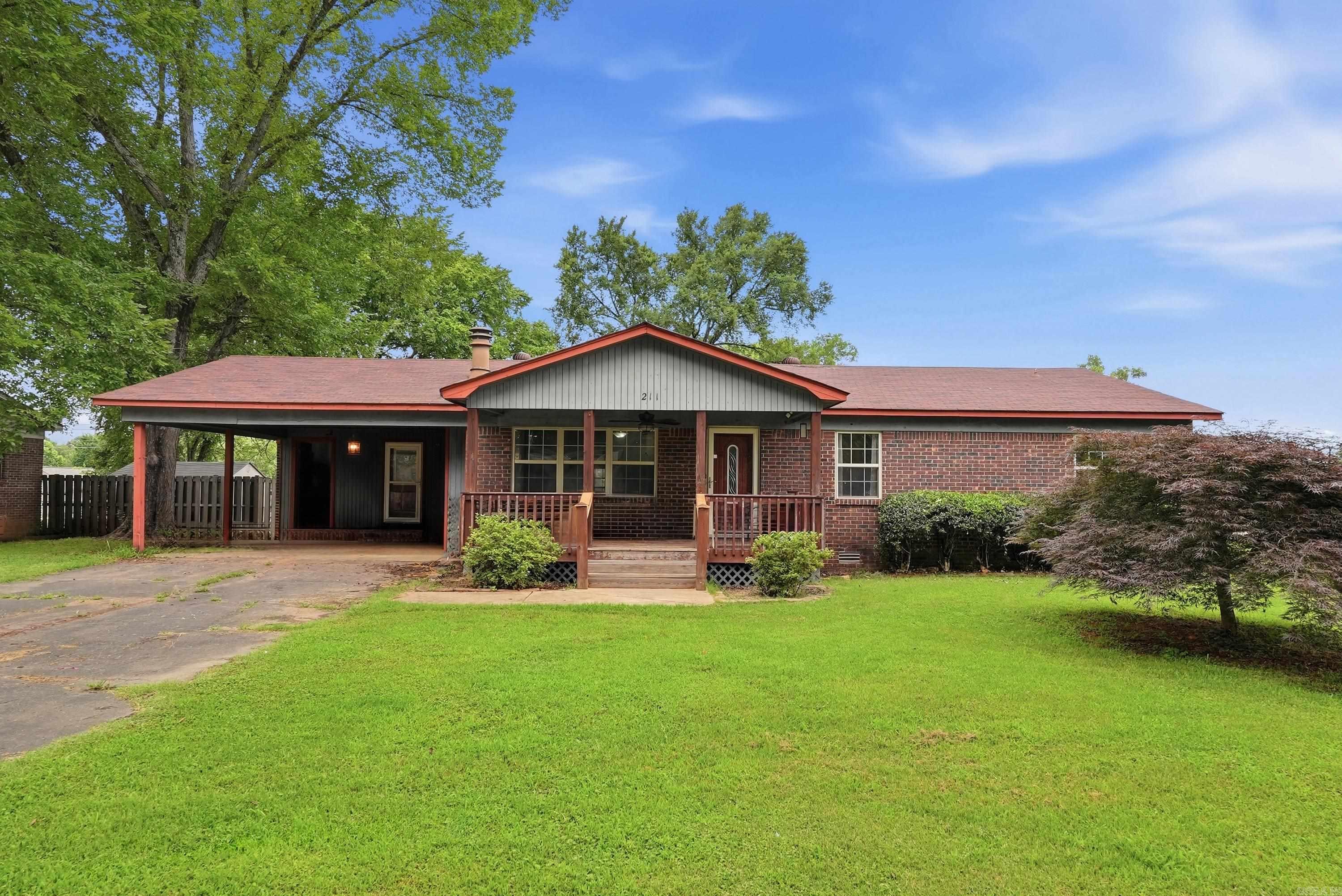 Check out Lake Hamilton's newest listing! This 3 Bed 2 Bath home just hit the market and is located in an ideal location. Whether you're looking for a primary residence, summer home, or rental investment this property checks all of the boxes. Situated just steps away from the lake and a short drive to shopping, restaurants, and entertainment. Key features include a front & back porch, wood burning fireplace, sliding doors in primary bedroom, granite counter tops & tile back splash,  all electric, a generous Den, and extra storage located in the carport. Make your next home in lovely Hot Springs National Park! Call today