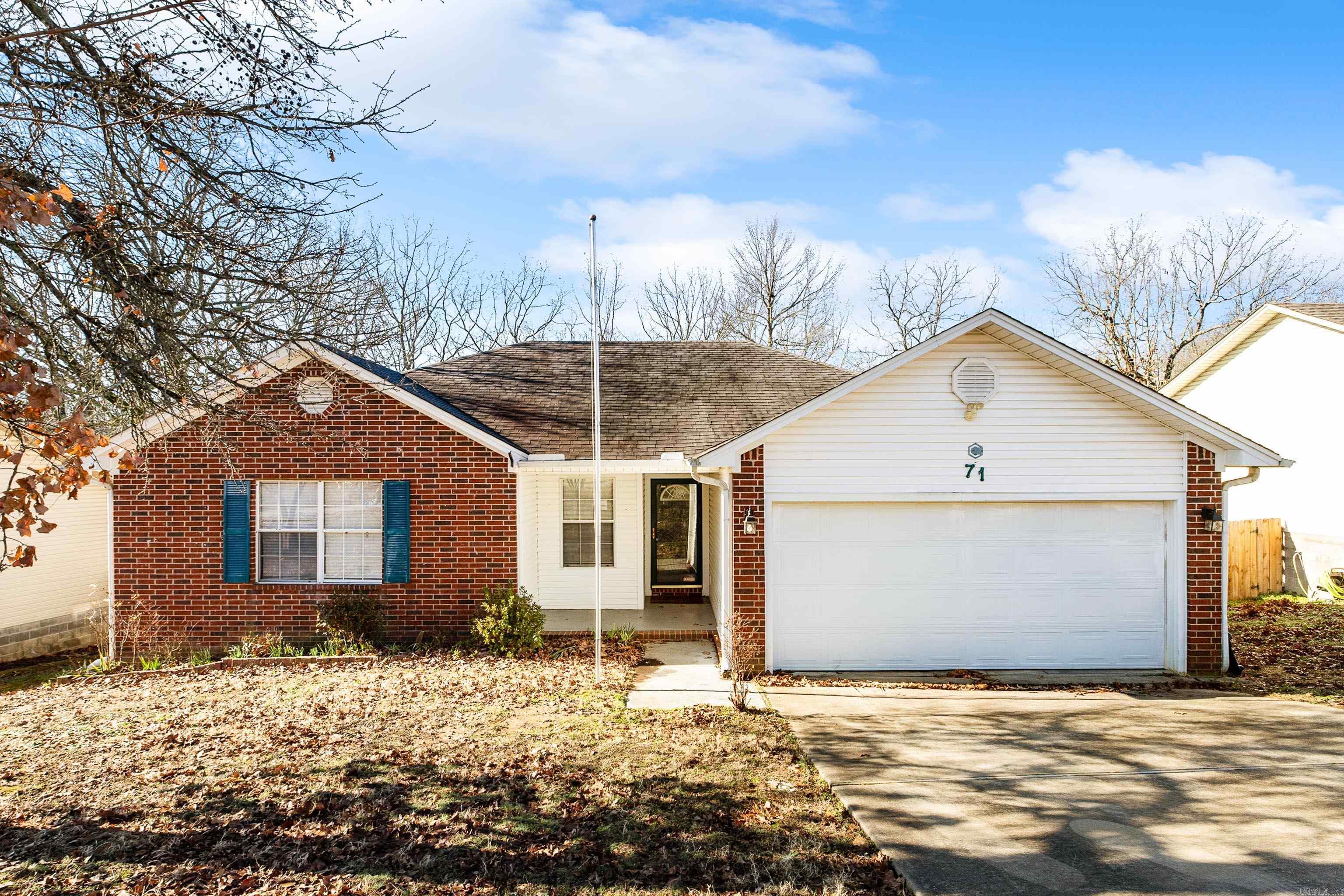 Welcome to 71 Cinnamon!  This move-in-ready home is ready for its new owner but could also serve as an investment property.  This three-bedroom, two-bathroom home features a functional split-floorplan centered around a spacious living area. A standout feature is the cozy wood-burning fireplace, perfect for creating a warm and relaxing environment during the cooler months.   Outside you'll find a large deck overlooking the fully fenced backyard that provides plenty of space for pets, entertaining, or any other outdoor activities.  Additionally, the property includes a dedicated workshop equipped with electricity, offering a flexible space for projects or storage.